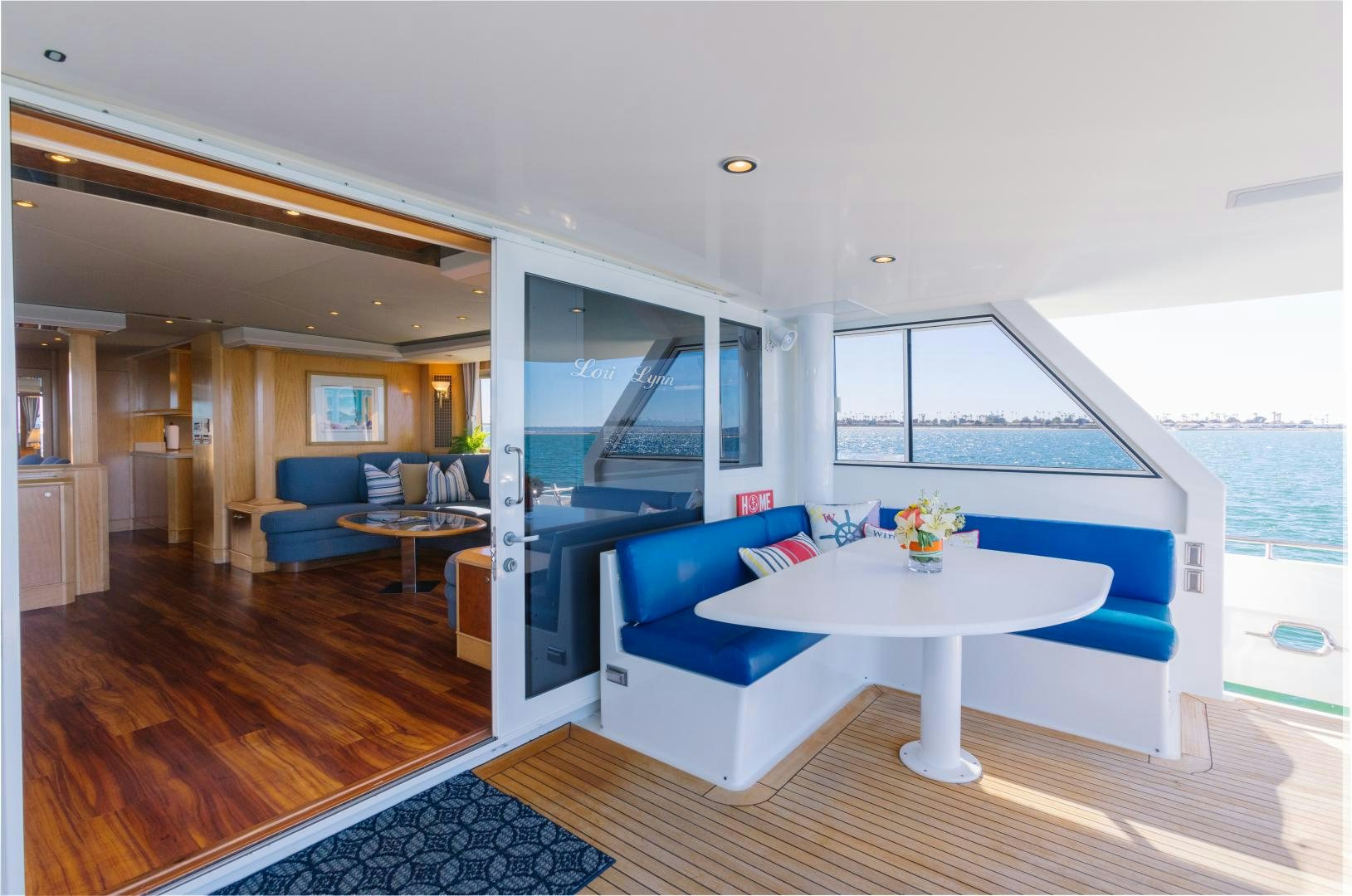 a living room with a large window aboard LORI LYNN Yacht for Sale