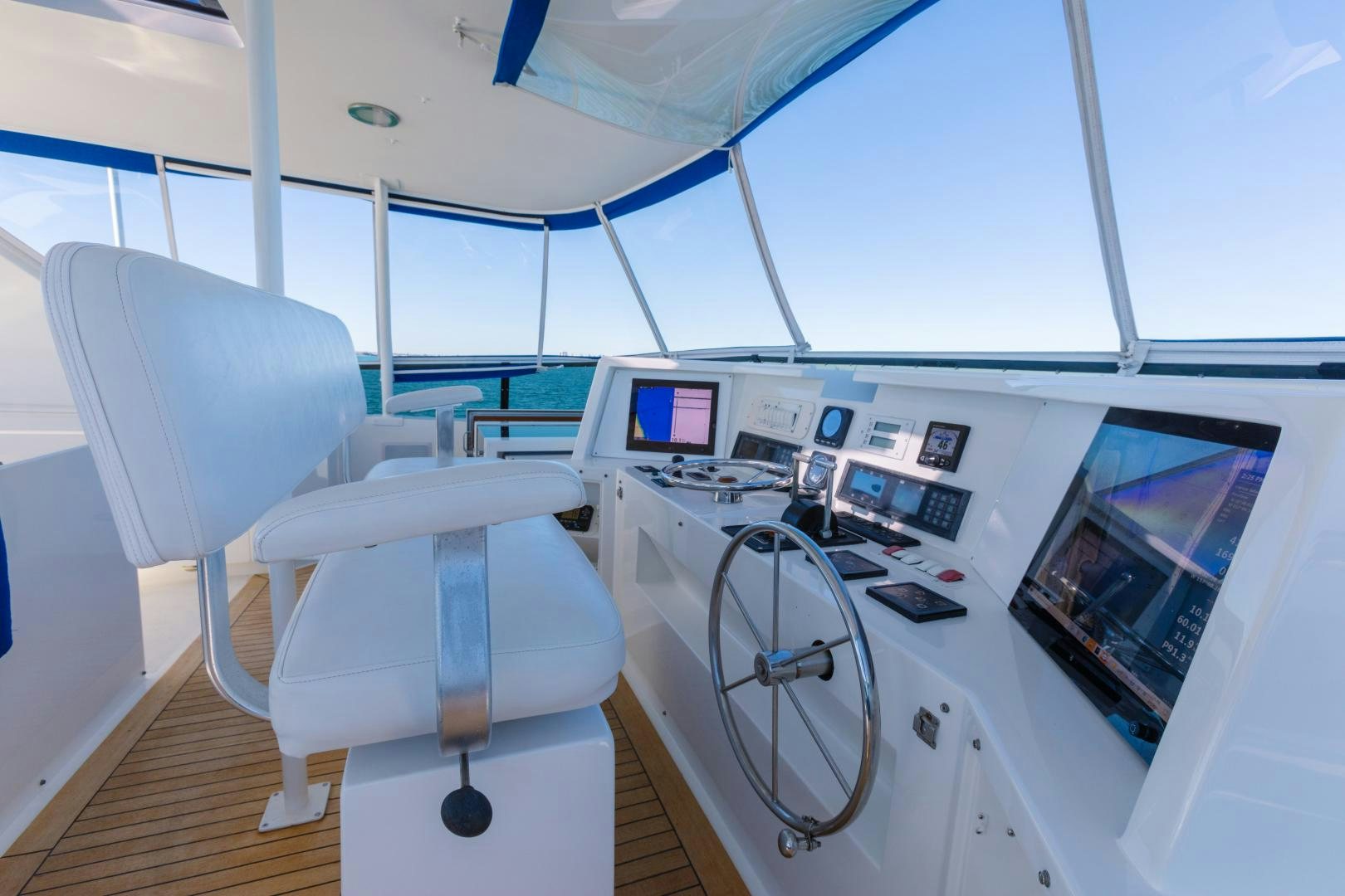 a room with computers and monitors aboard LORI LYNN Yacht for Sale