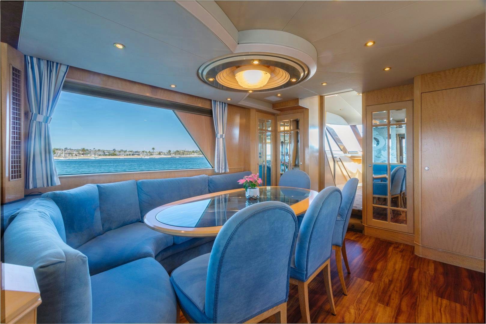 a living room with a large pool aboard LORI LYNN Yacht for Sale