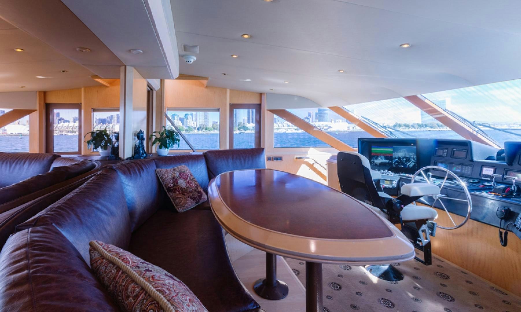 a living room with a couch and a table aboard LORI LYNN Yacht for Sale