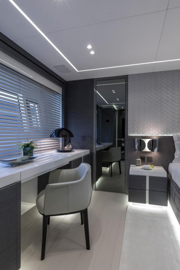 a room with a desk and a chair aboard NANA I Yacht for Sale