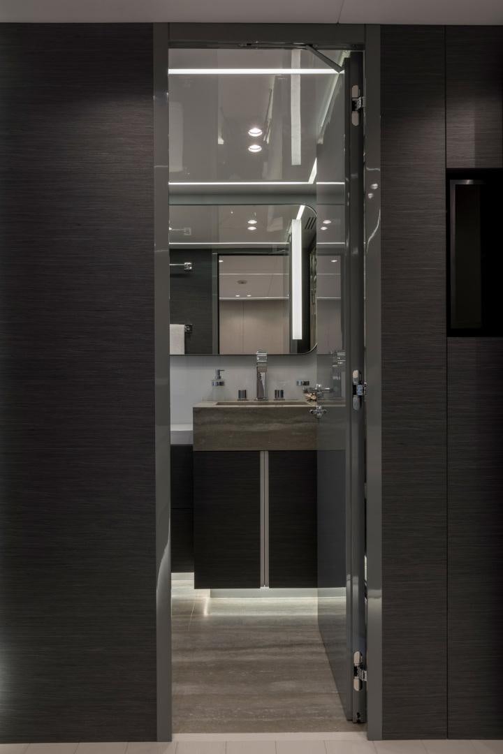 a bathroom with a sink and a mirror aboard NANA I Yacht for Sale