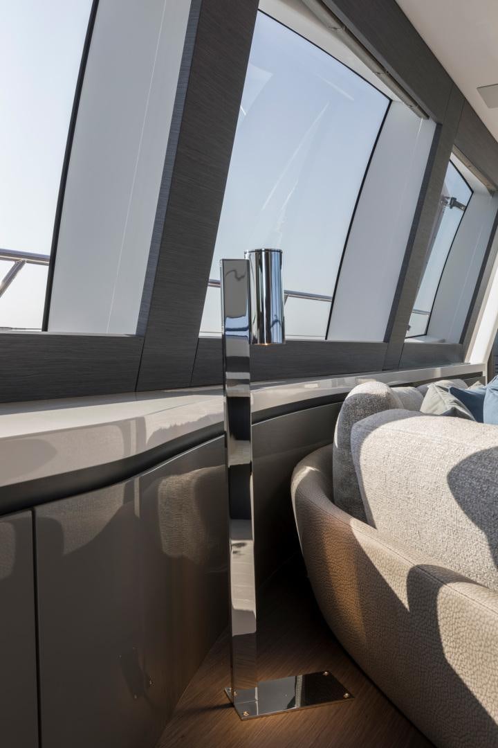 a black and silver object on a wooden surface aboard NANA I Yacht for Sale