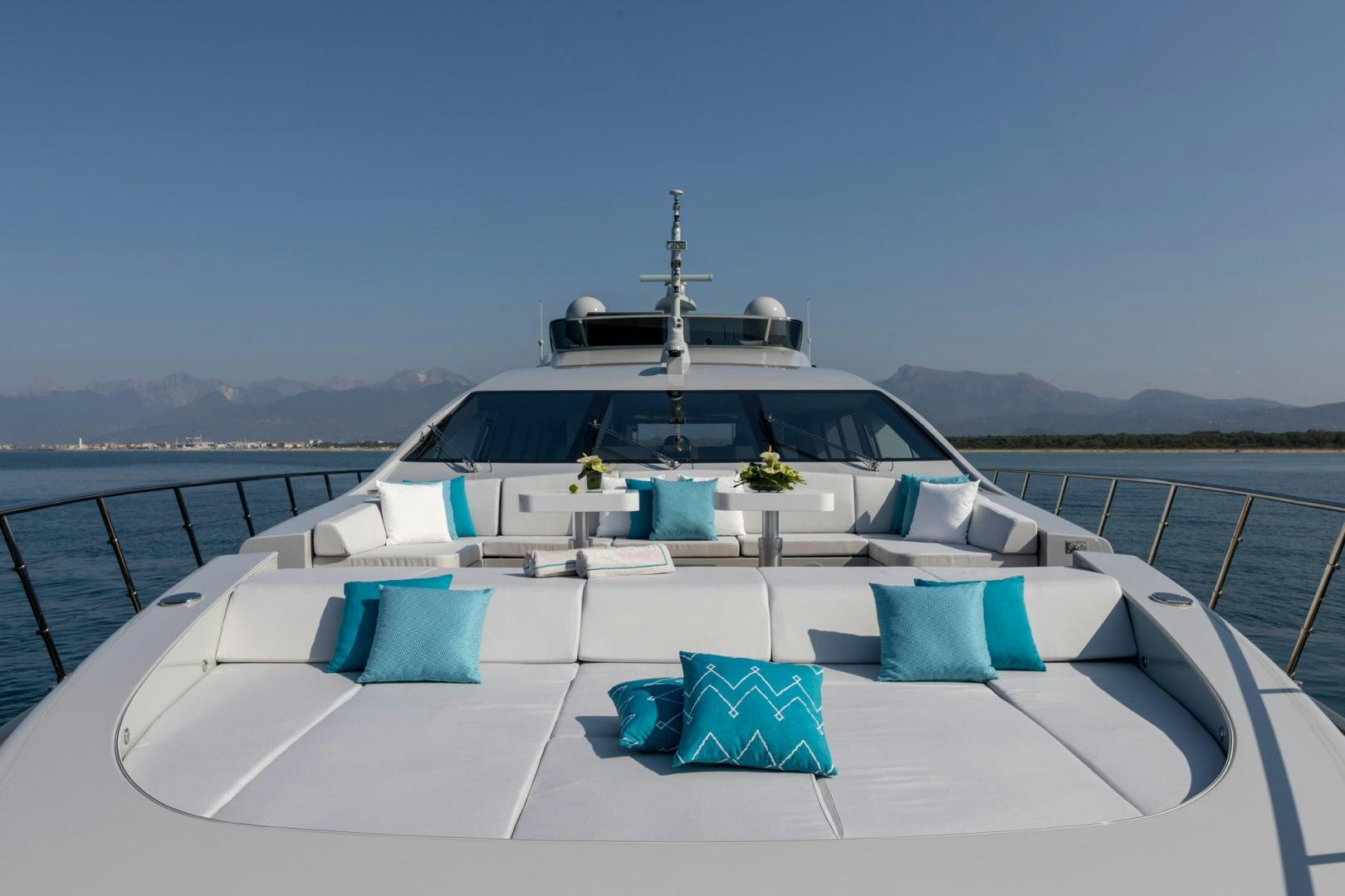 a white boat on a large body of water aboard NANA I Yacht for Sale