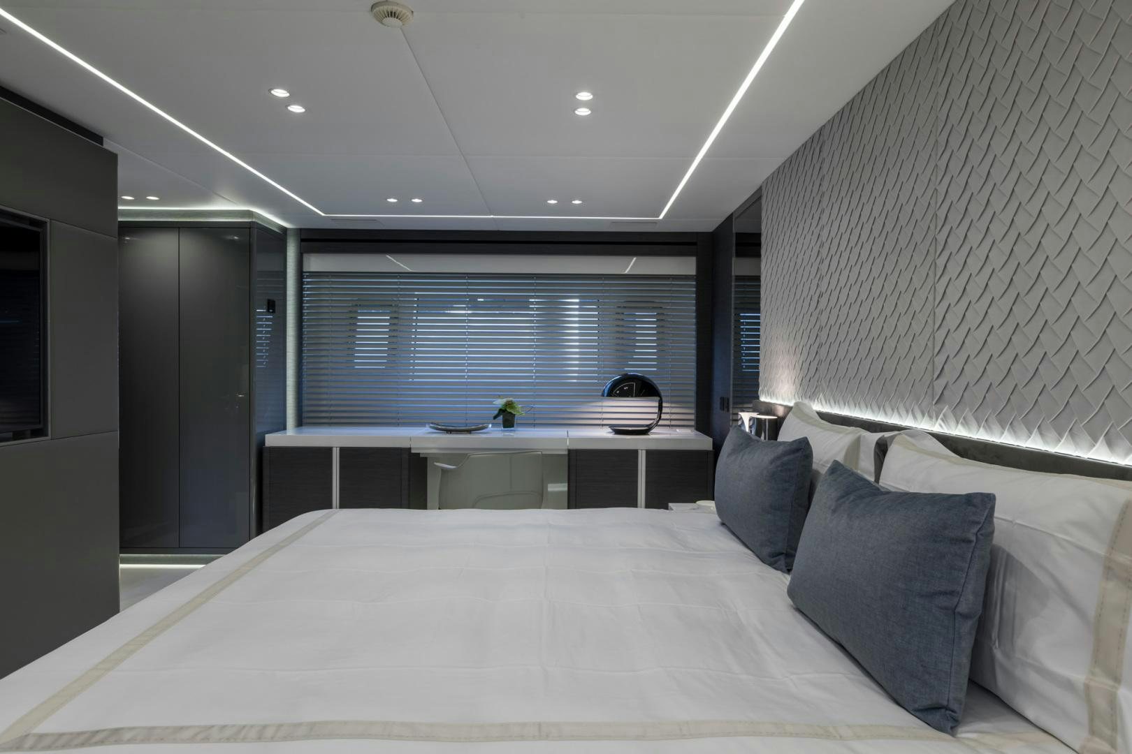 a bed with a white sheet aboard NANA I Yacht for Sale