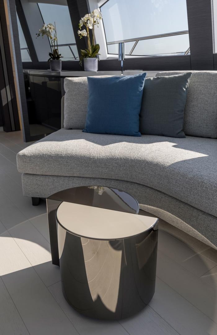 a couch with pillows aboard NANA I Yacht for Sale