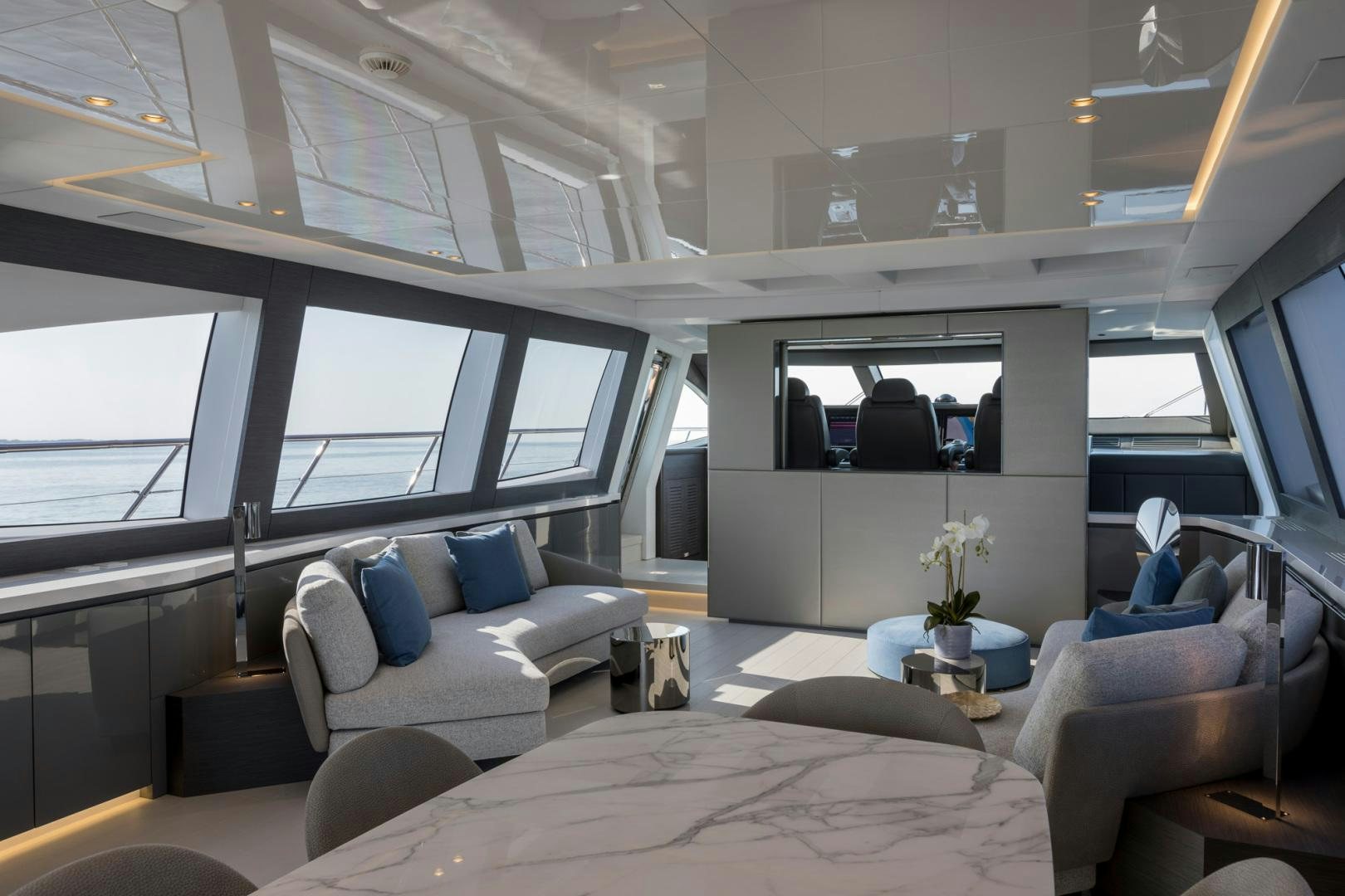 a room with a couch and a television in it aboard NANA I Yacht for Sale