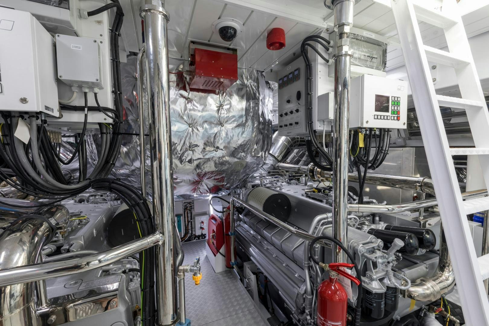 a large white machine with wires aboard NANA I Yacht for Sale