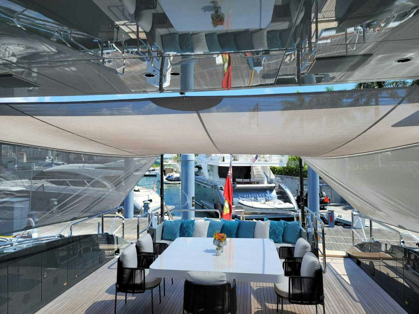 a large white and blue space ship aboard NANA I Yacht for Sale