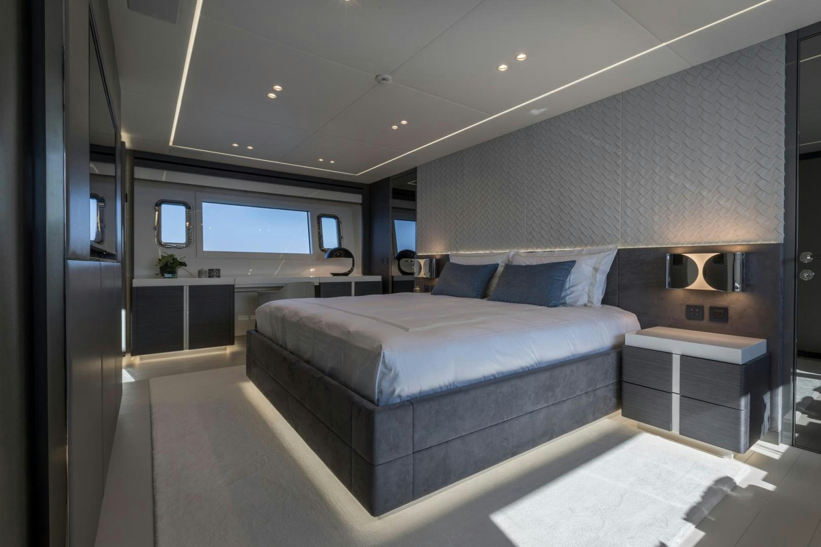 a large bed in a room aboard NANA I Yacht for Sale