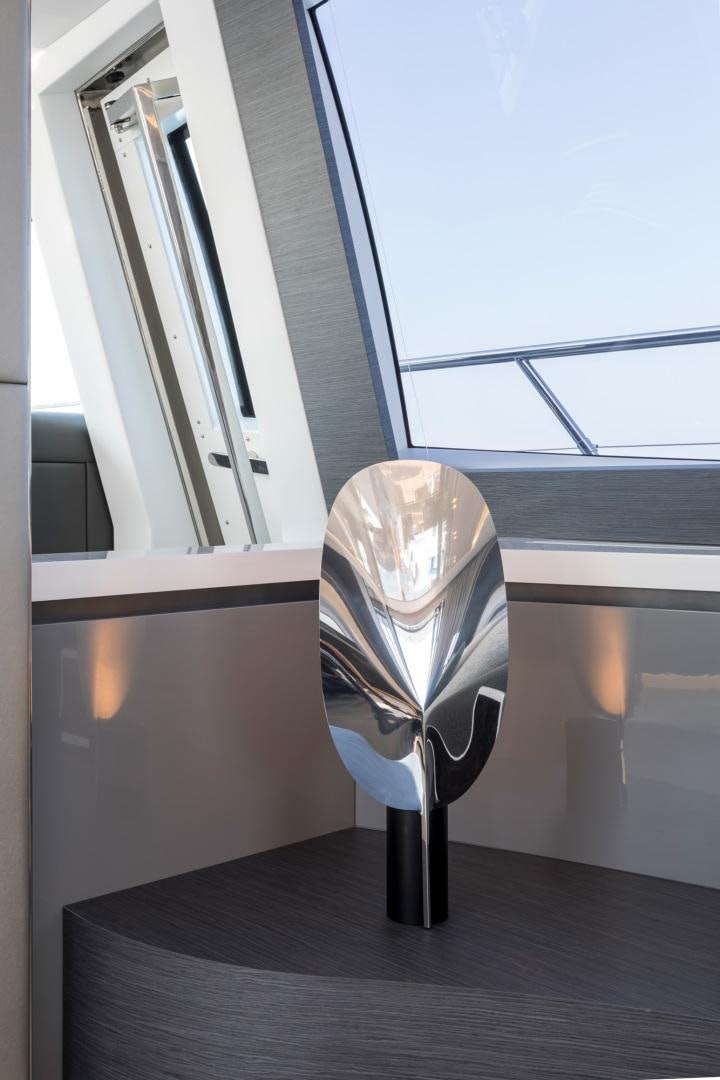 a helmet on a table aboard NANA I Yacht for Sale