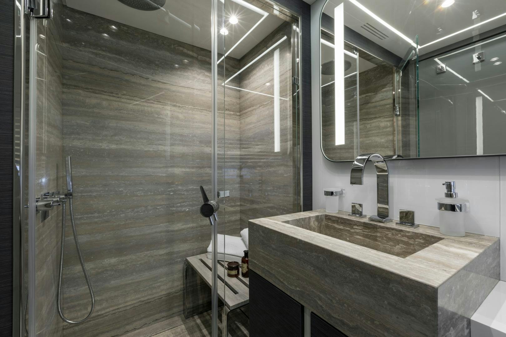 a bathroom with a sink and a mirror aboard NANA I Yacht for Sale