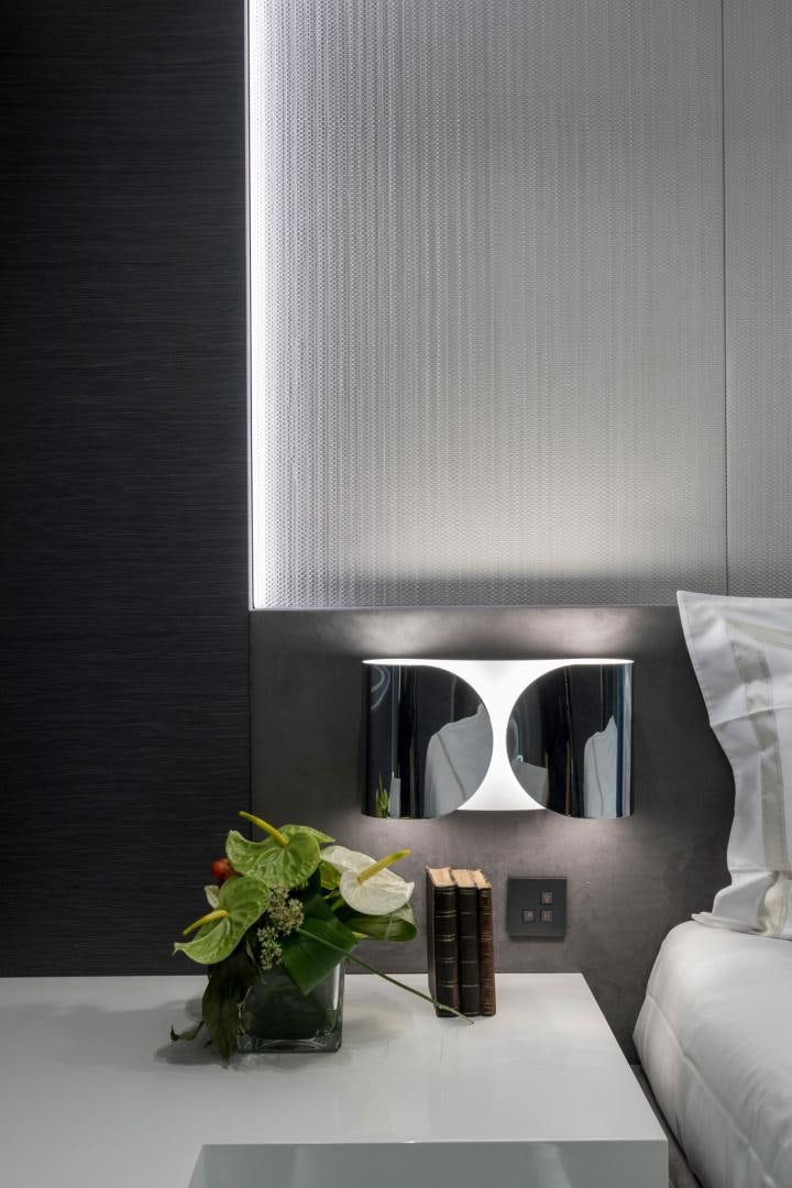 a white table with a mirror and flowers on it aboard NANA I Yacht for Sale