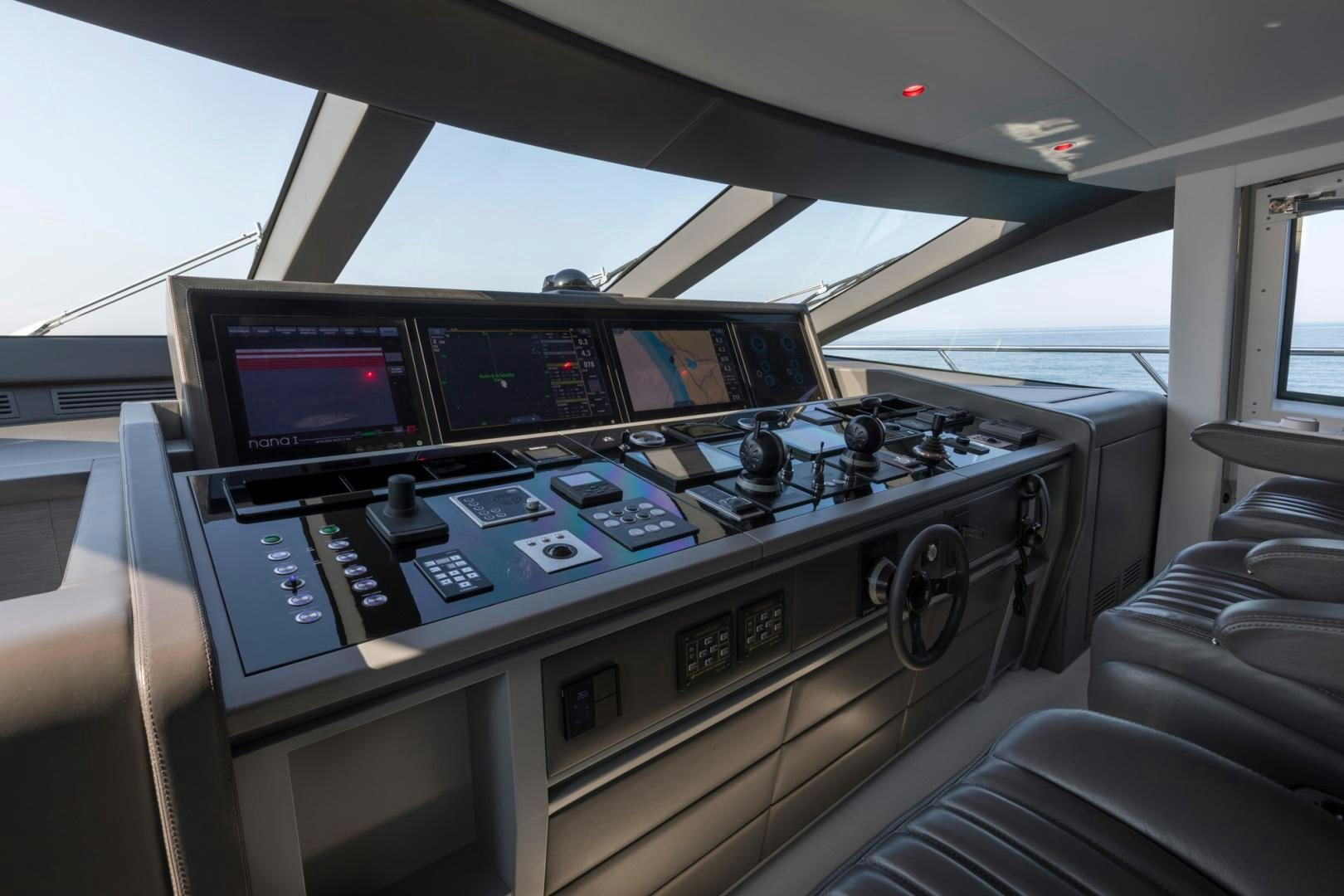 inside of a vehicle with monitors and controls aboard NANA I Yacht for Sale