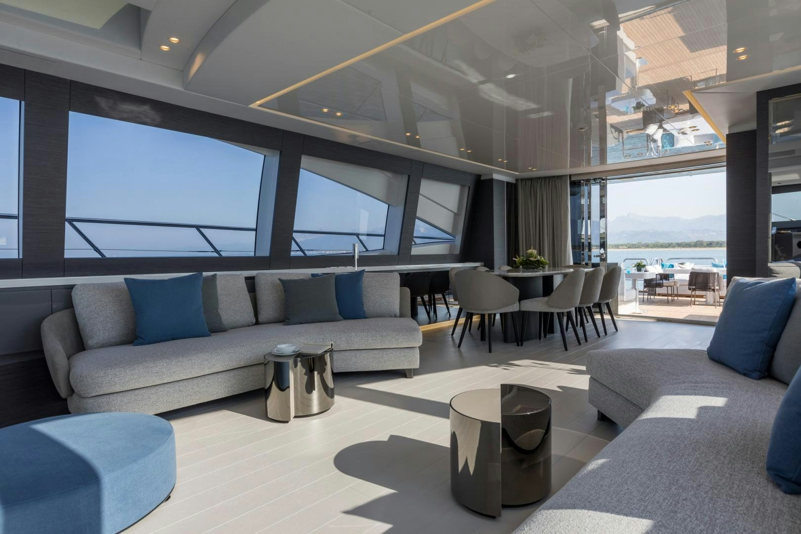 a living room with a large window aboard NANA I Yacht for Sale