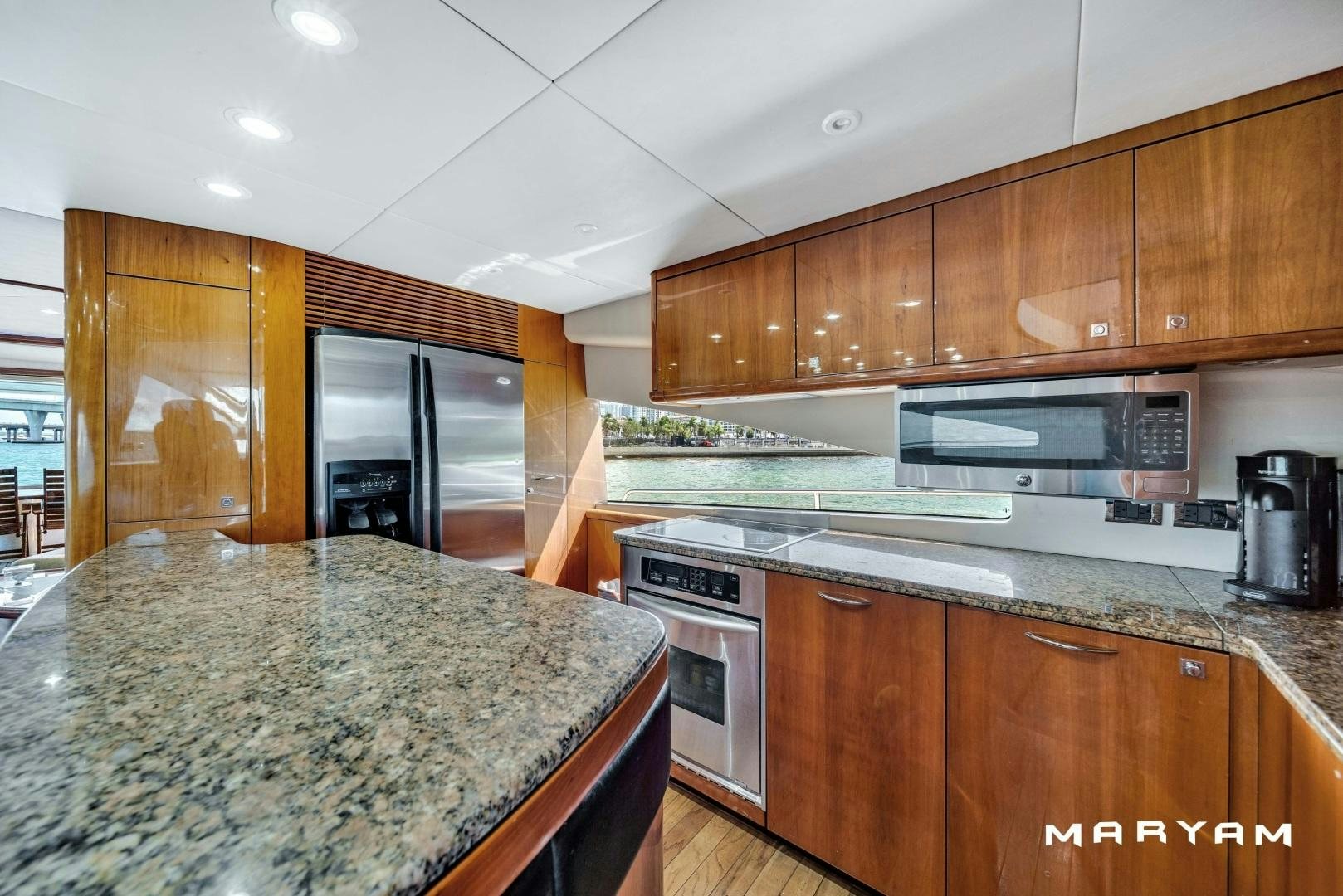a kitchen with a marble counter top aboard FINS UP Yacht for Sale