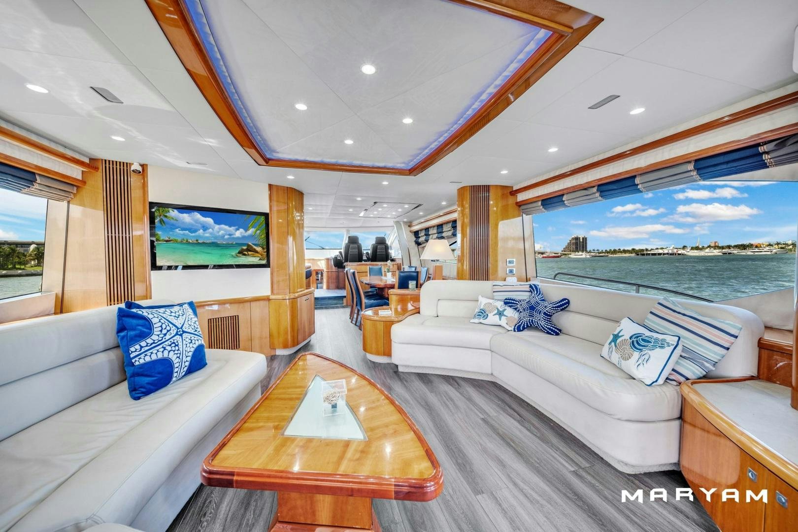 a living room with a large window aboard FINS UP Yacht for Sale