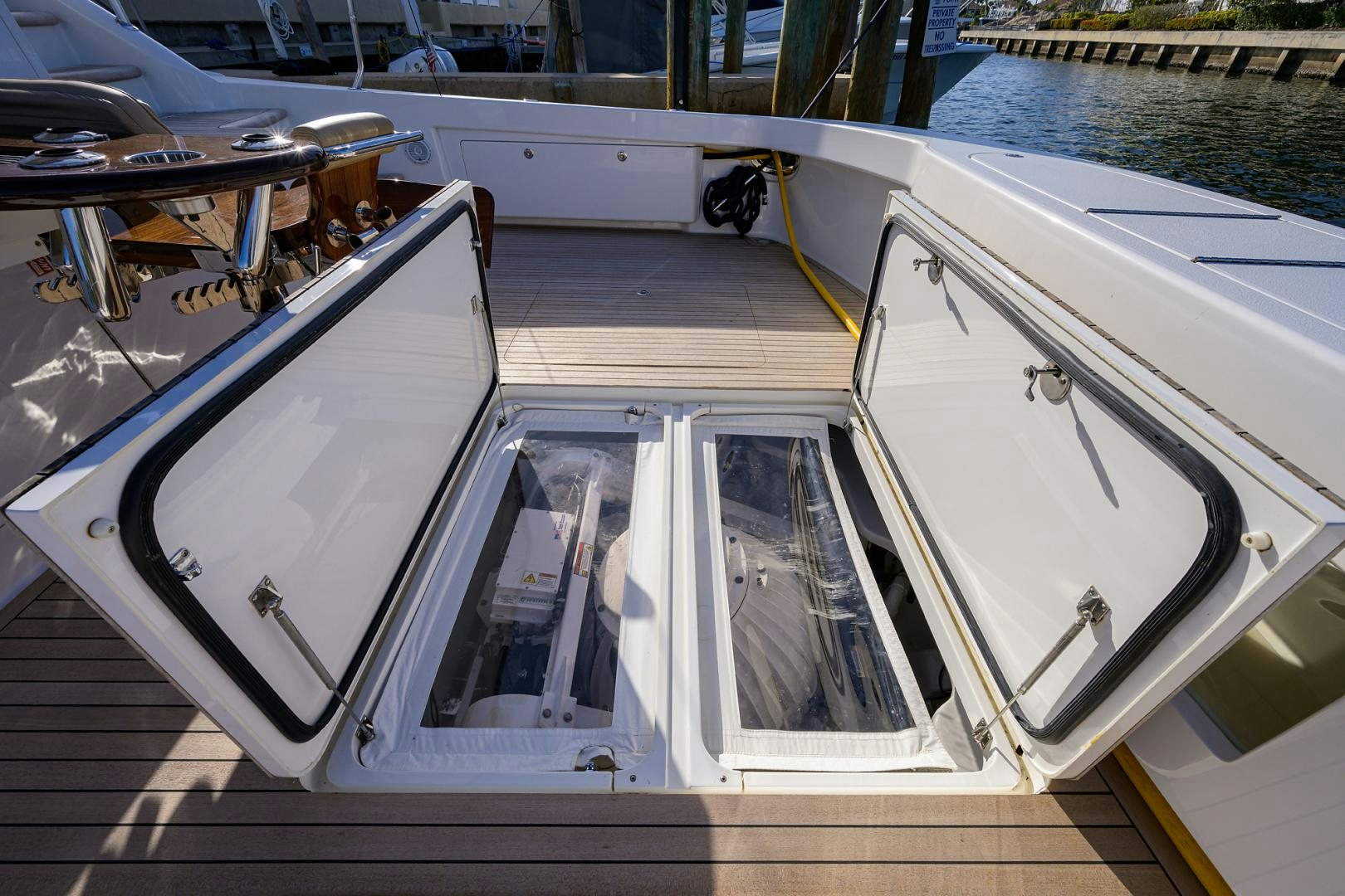 a boat with a steering wheel aboard PASTIME Yacht for Sale