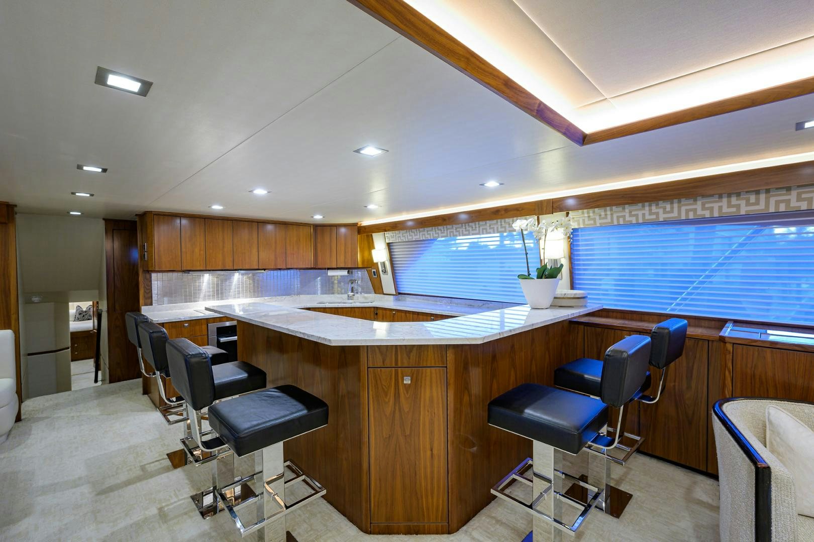 a large kitchen with a large island aboard PASTIME Yacht for Sale