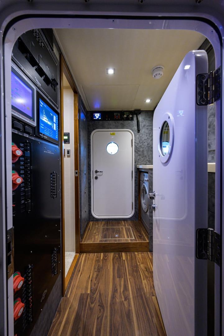 a row of machines in a room aboard PASTIME Yacht for Sale