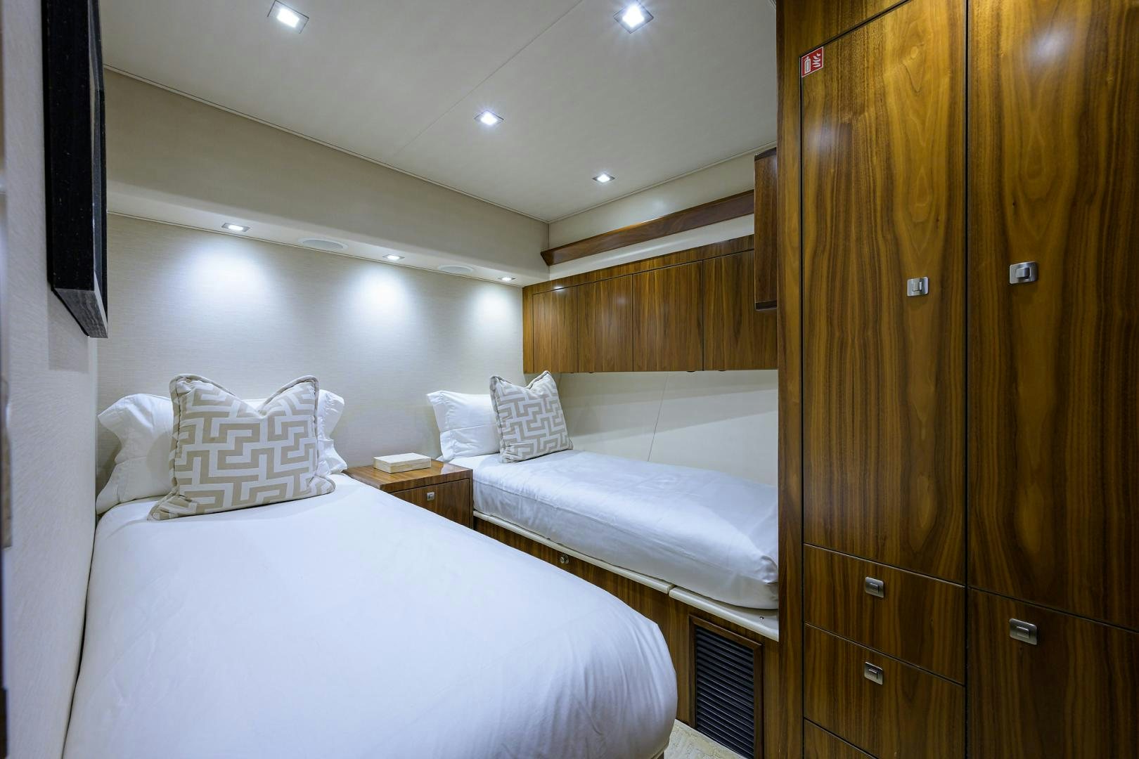 a couple of beds in a hotel room aboard PASTIME Yacht for Sale