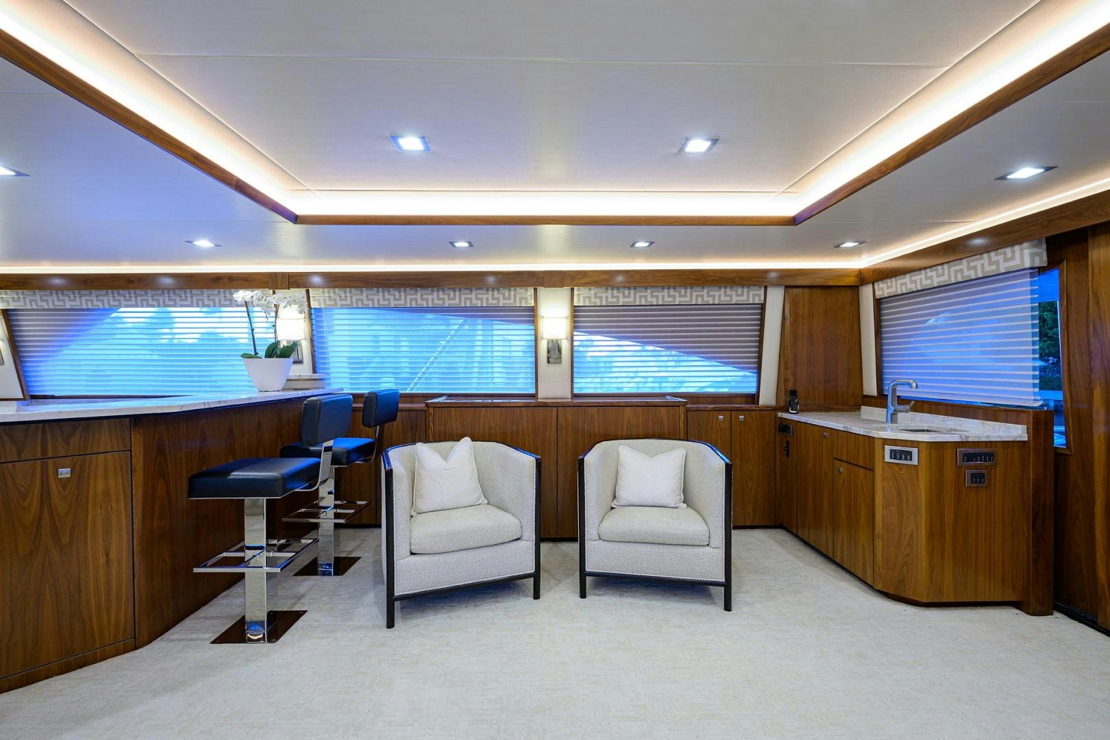 an empty office with chairs and a desk aboard PASTIME Yacht for Sale