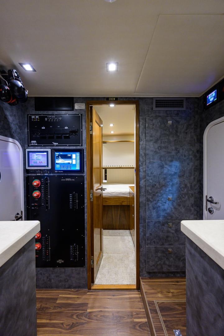 a bathroom with a glass door aboard PASTIME Yacht for Sale