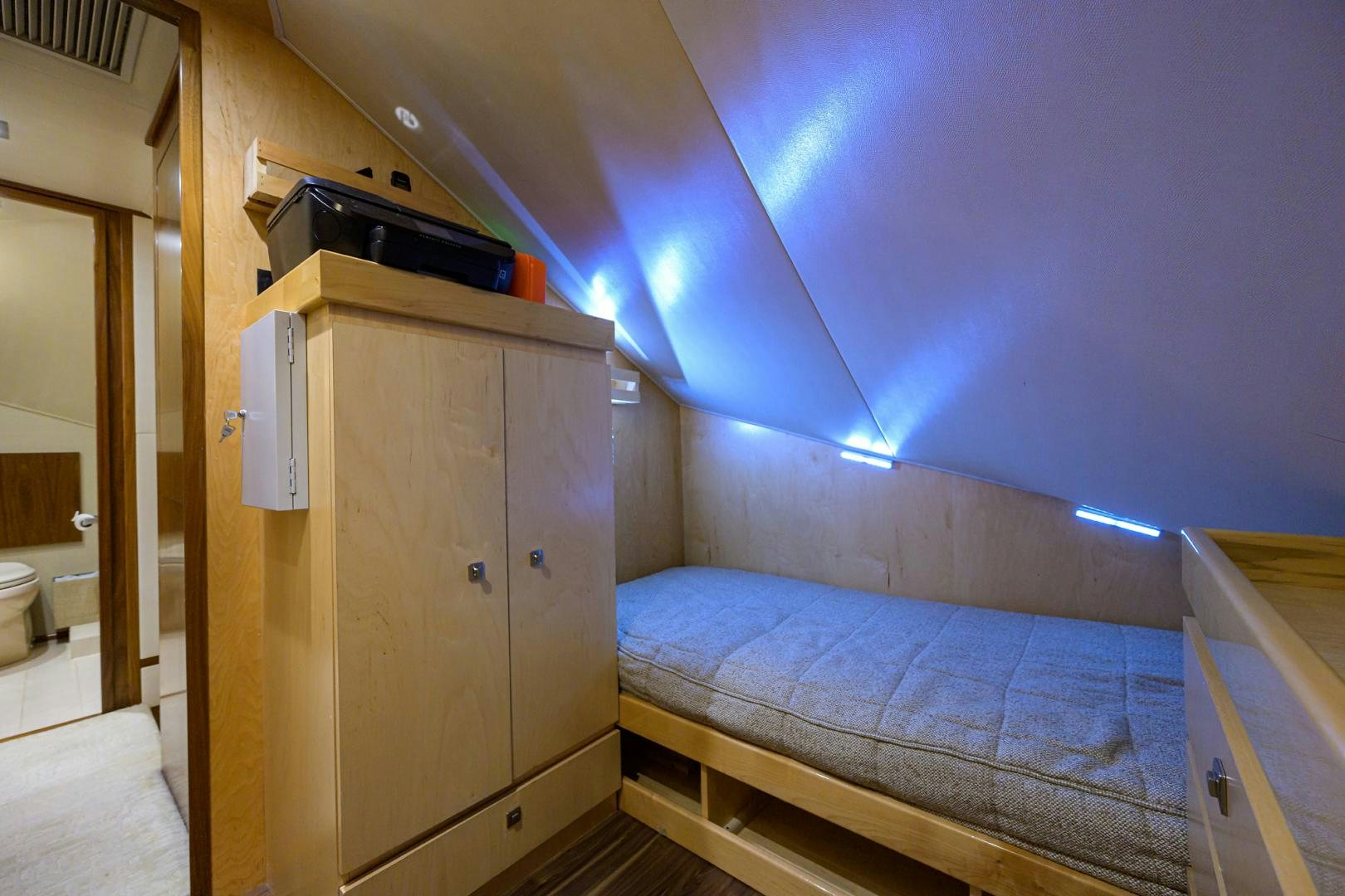 a bed in a room aboard PASTIME Yacht for Sale