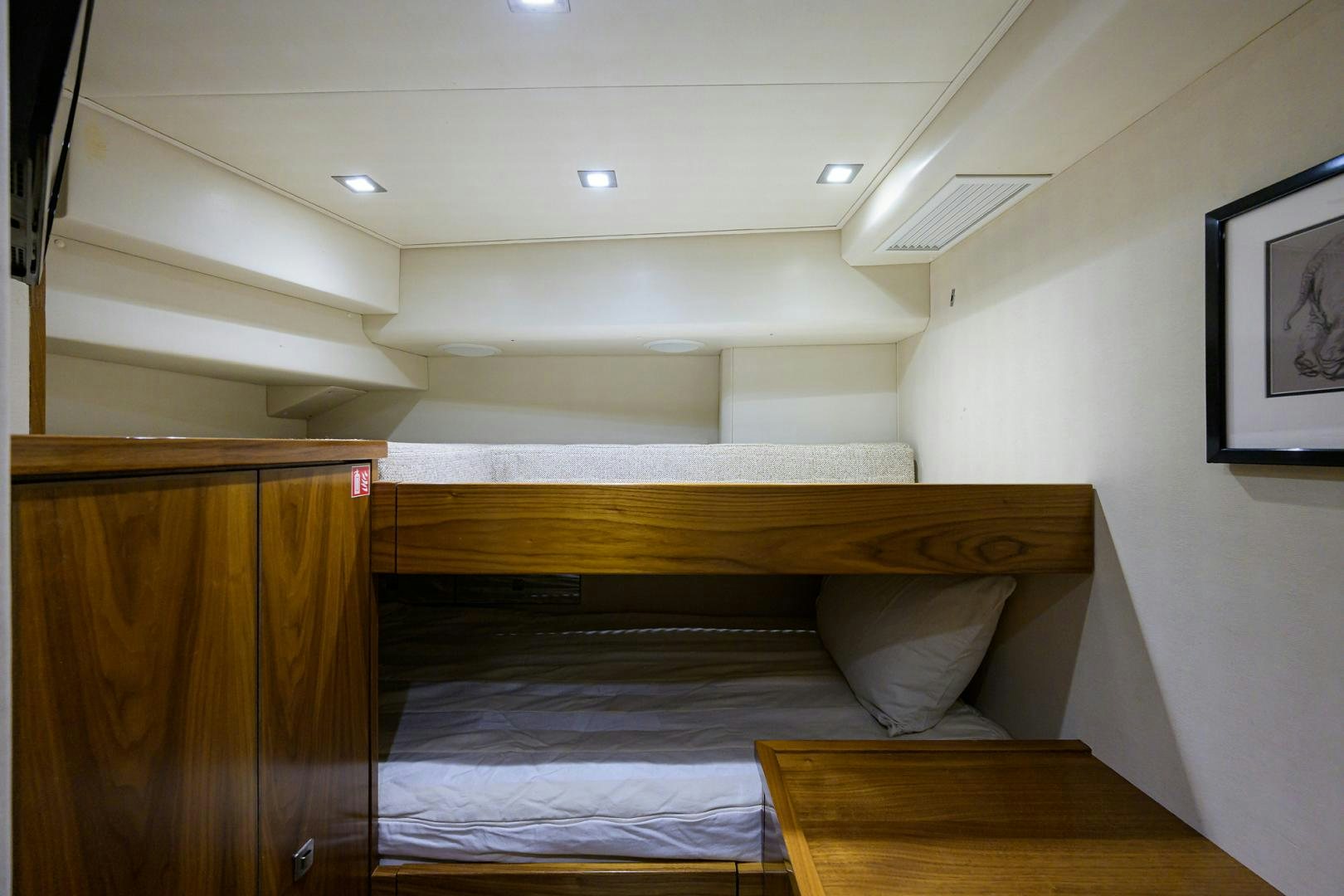 a bed in a room aboard PASTIME Yacht for Sale