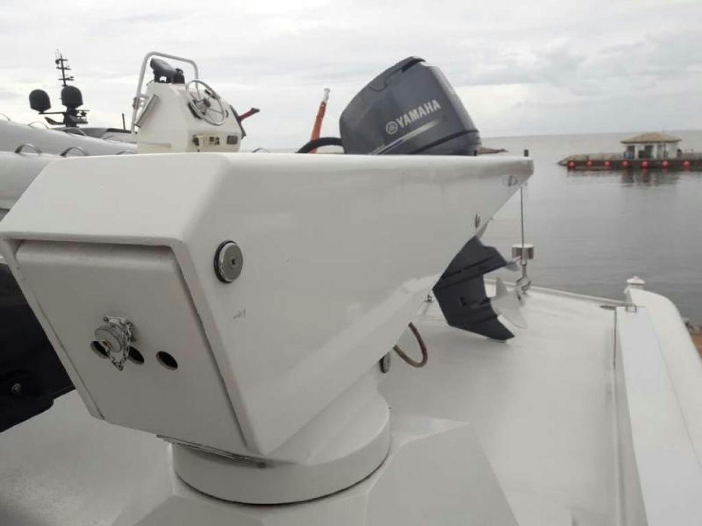 a boat with a hat on the front aboard TRUE NORTH Yacht for Sale