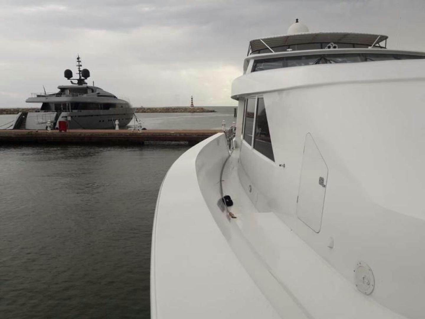 a couple of boats sit in the water aboard TRUE NORTH Yacht for Sale