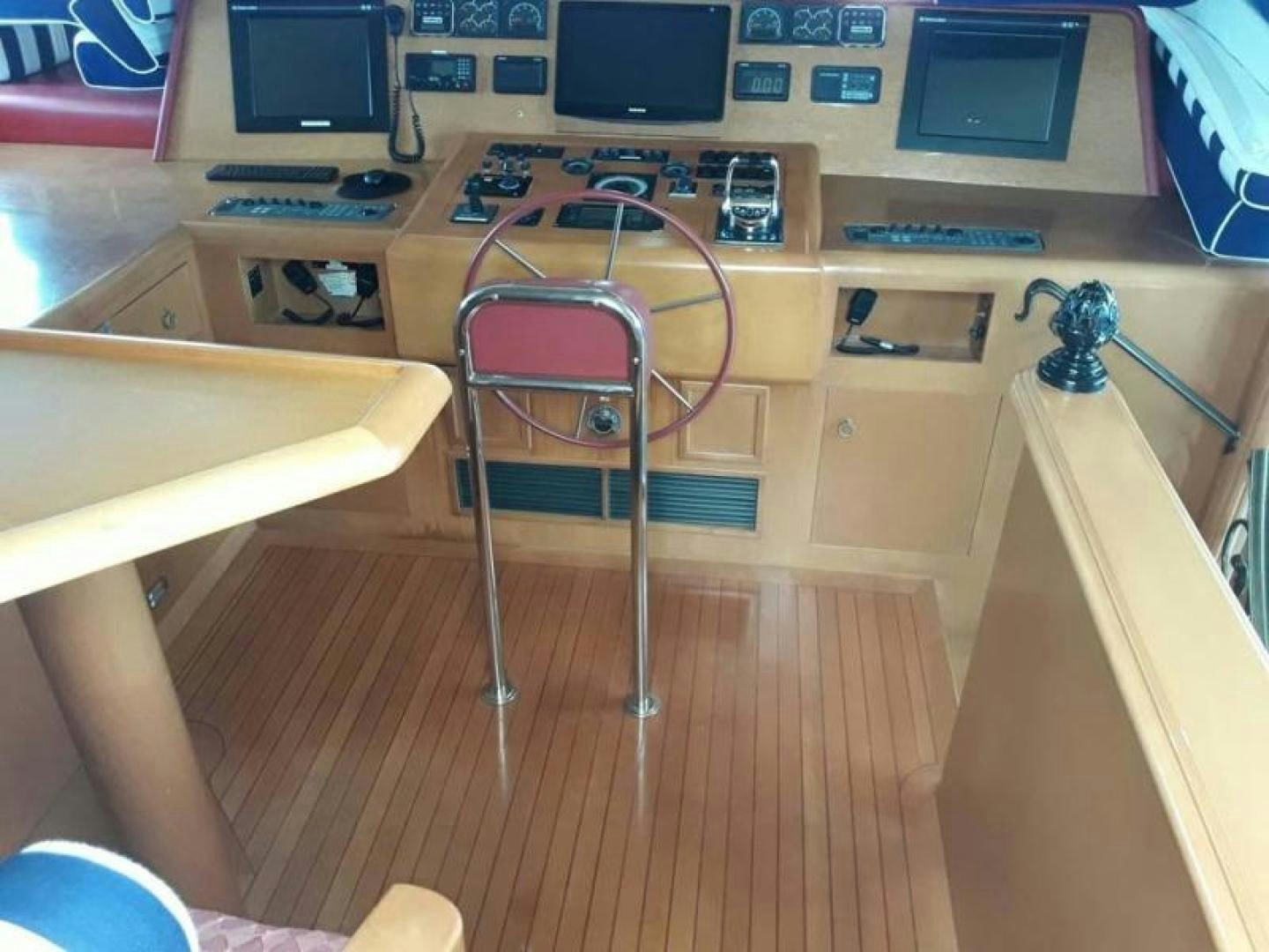 a chair in a room aboard TRUE NORTH Yacht for Sale