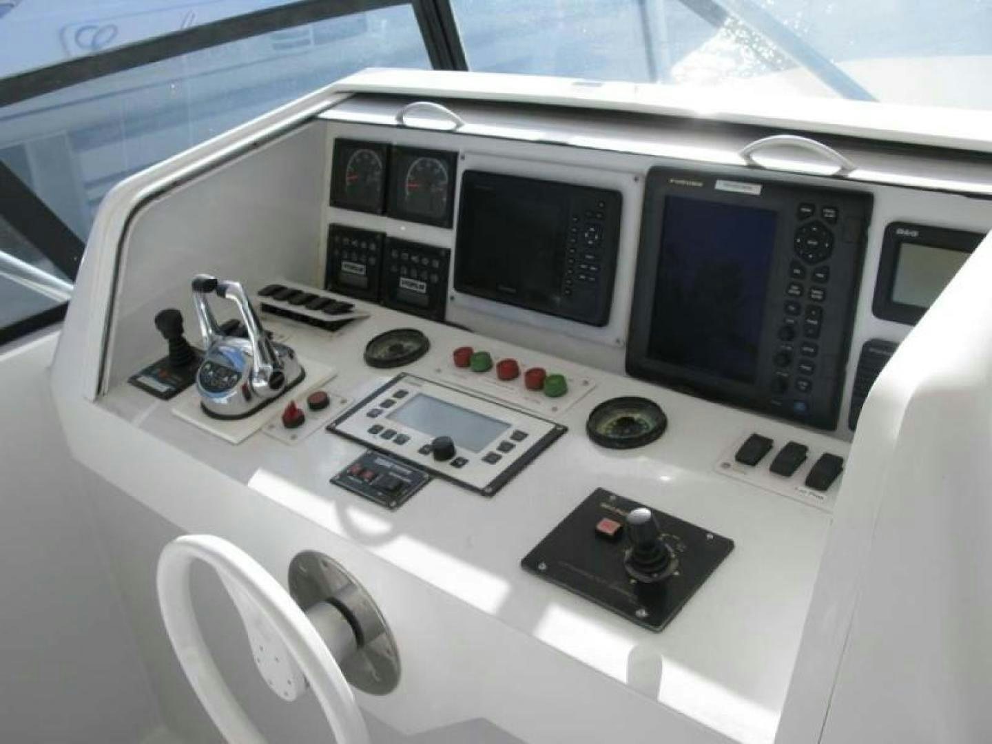 a white machine with buttons and knobs aboard TRUE NORTH Yacht for Sale