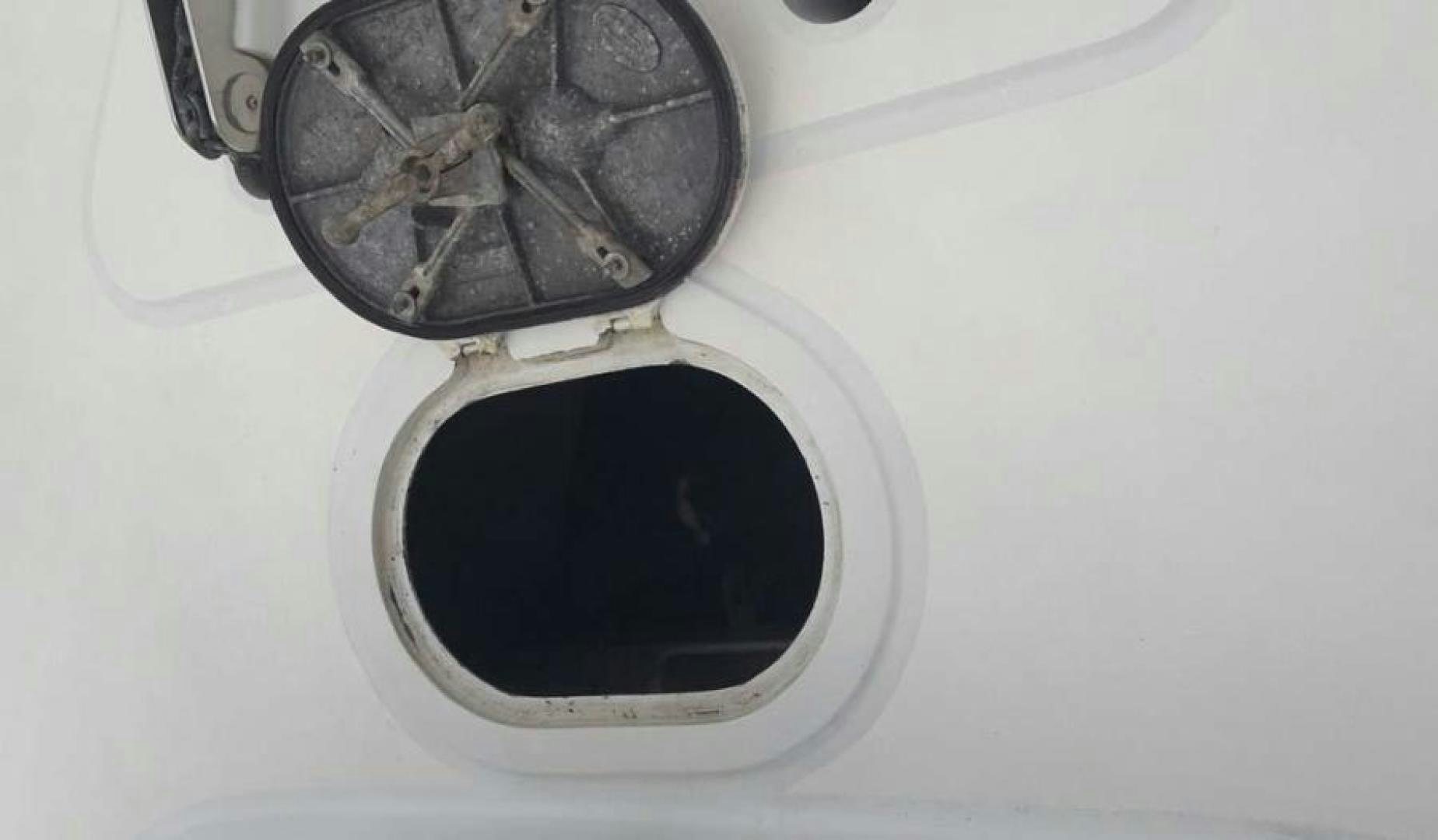 a close-up of a car tire aboard TRUE NORTH Yacht for Sale