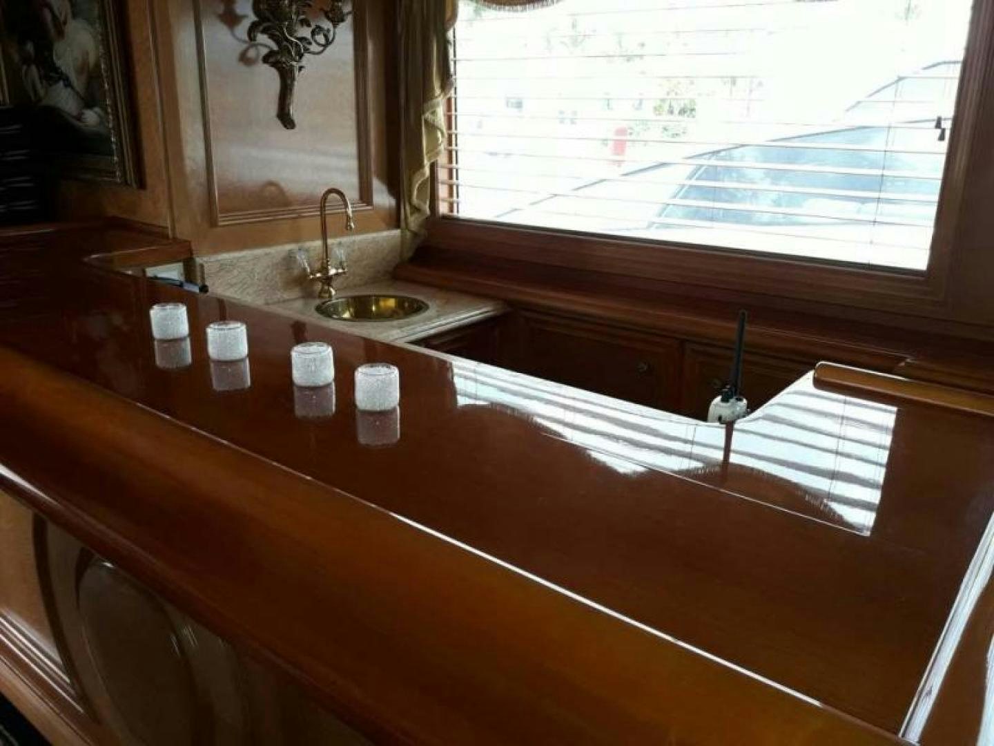 a counter top with cups on it aboard TRUE NORTH Yacht for Sale