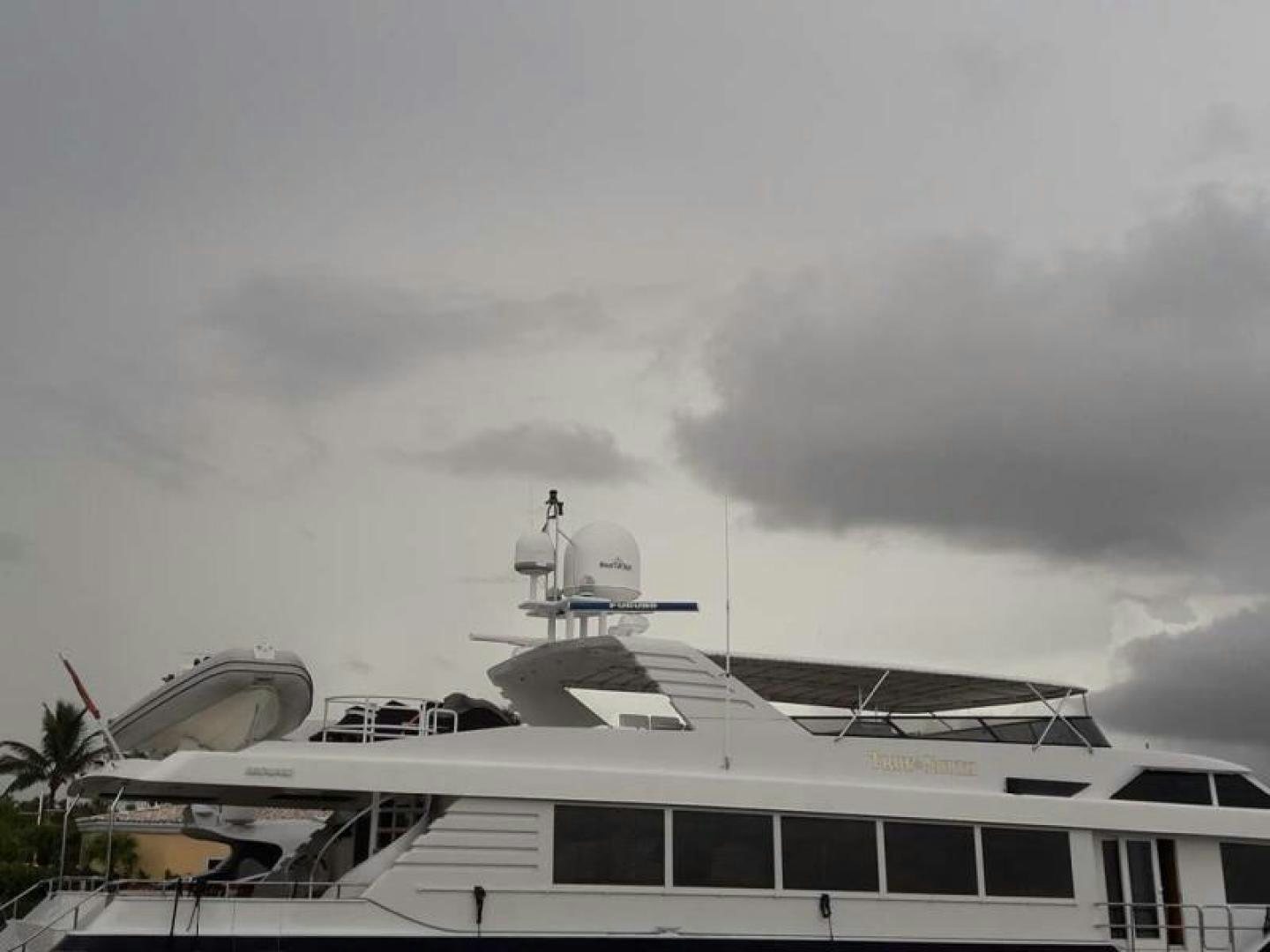 a boat docked at a pier aboard TRUE NORTH Yacht for Sale