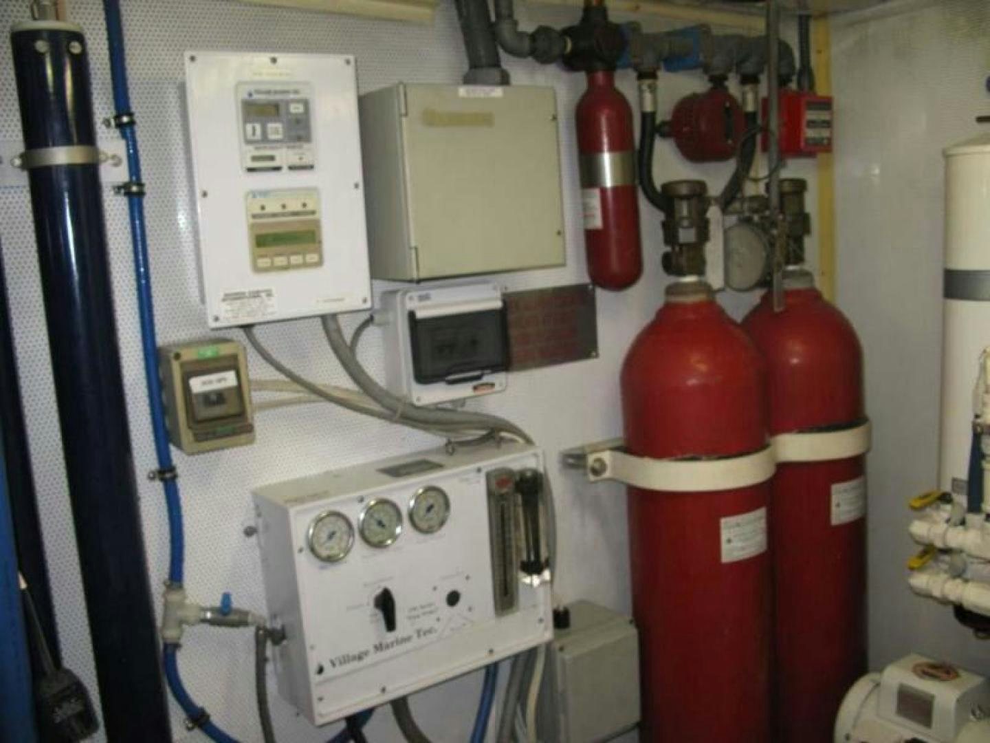 a red and white machine aboard TRUE NORTH Yacht for Sale