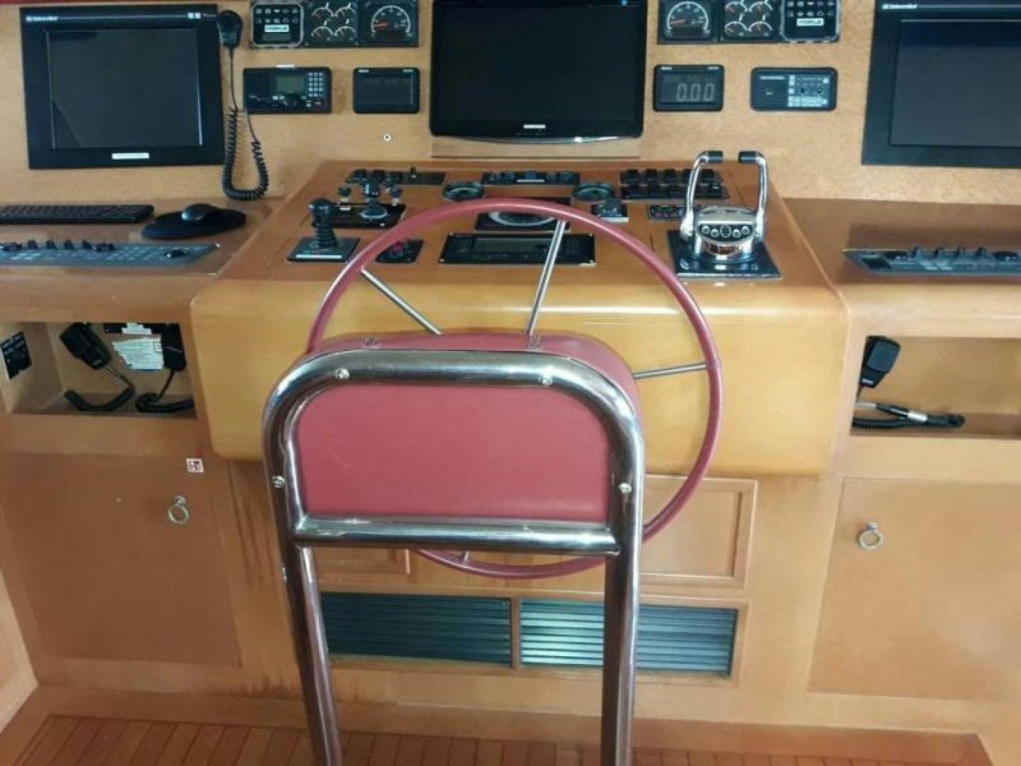 a chair in front of a desk aboard TRUE NORTH Yacht for Sale