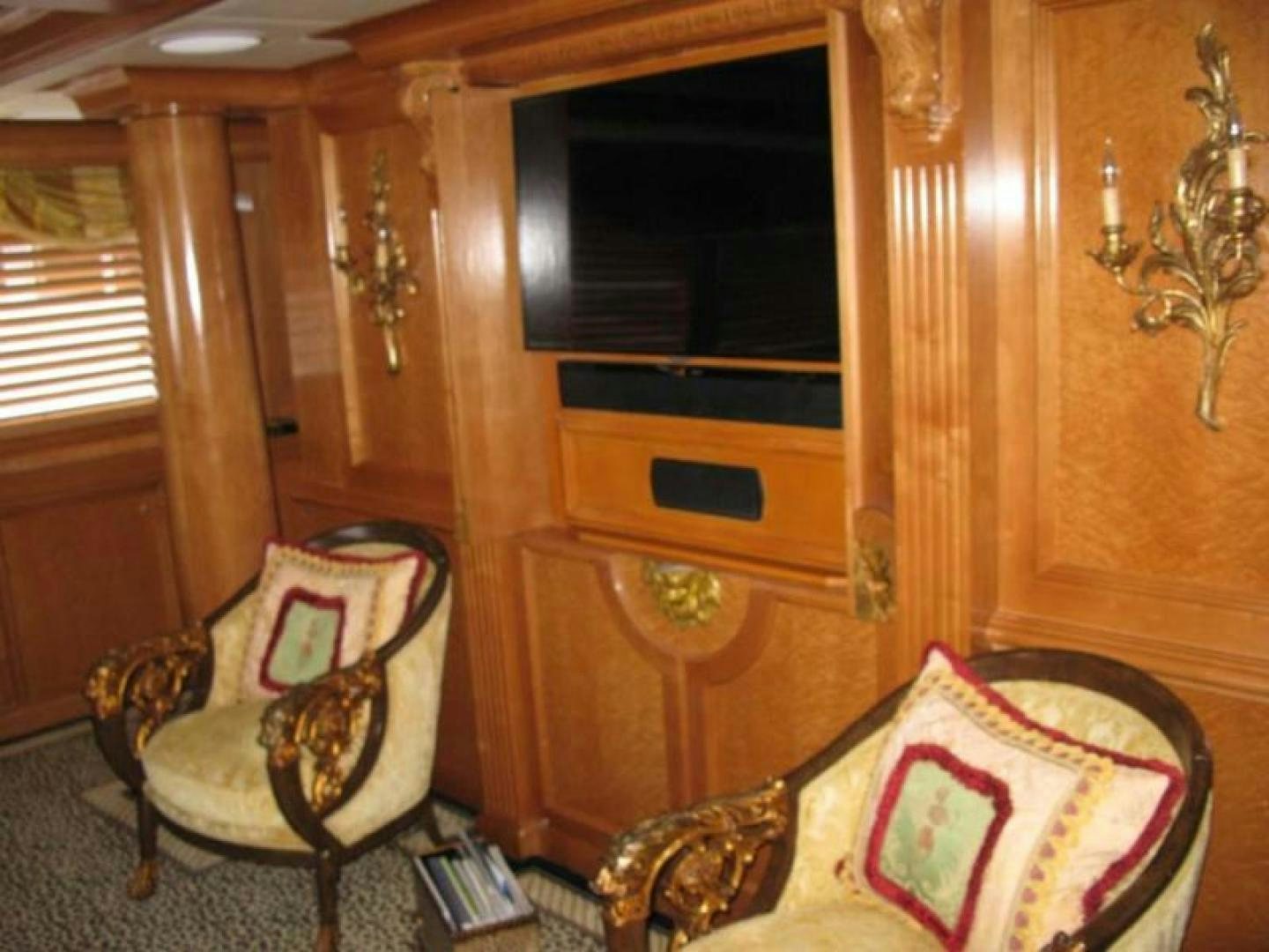 a chair in a room aboard TRUE NORTH Yacht for Sale