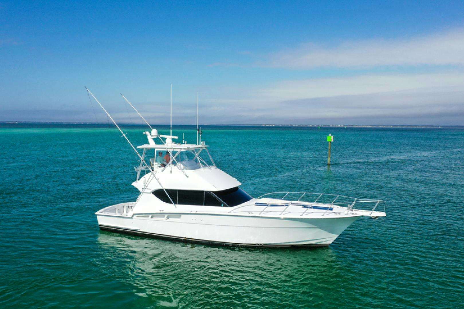 a white boat in the water aboard Knot On Call Yacht for Sale