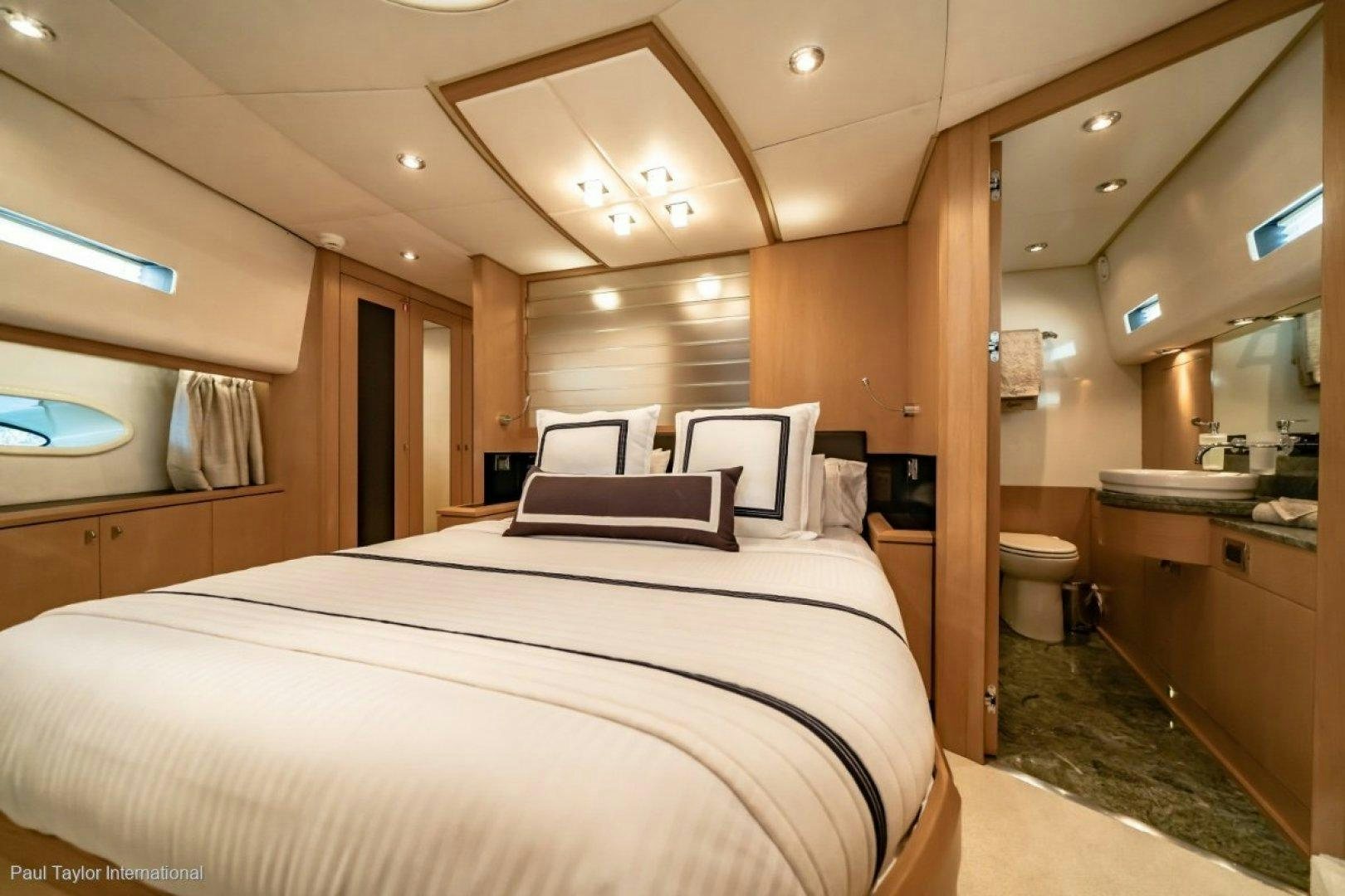 a room with a bed and a sink aboard SOPHIA Yacht for Sale