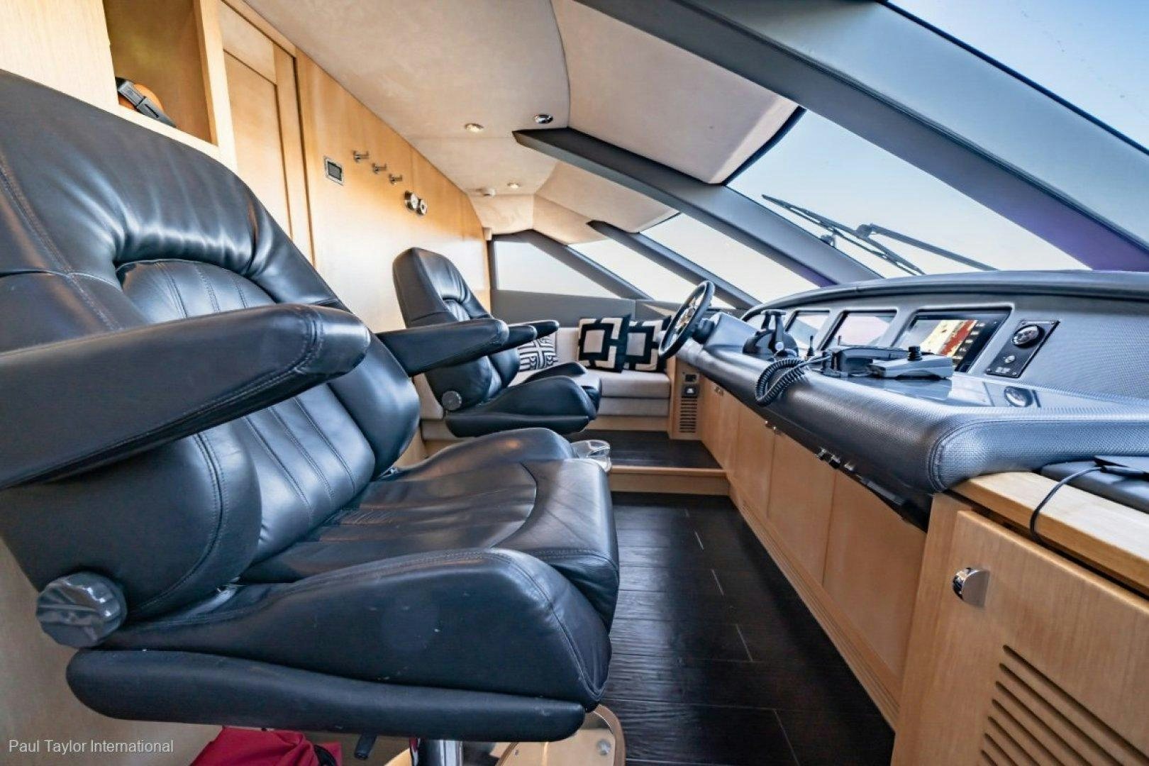 a room with a couch and a chair aboard SOPHIA Yacht for Sale