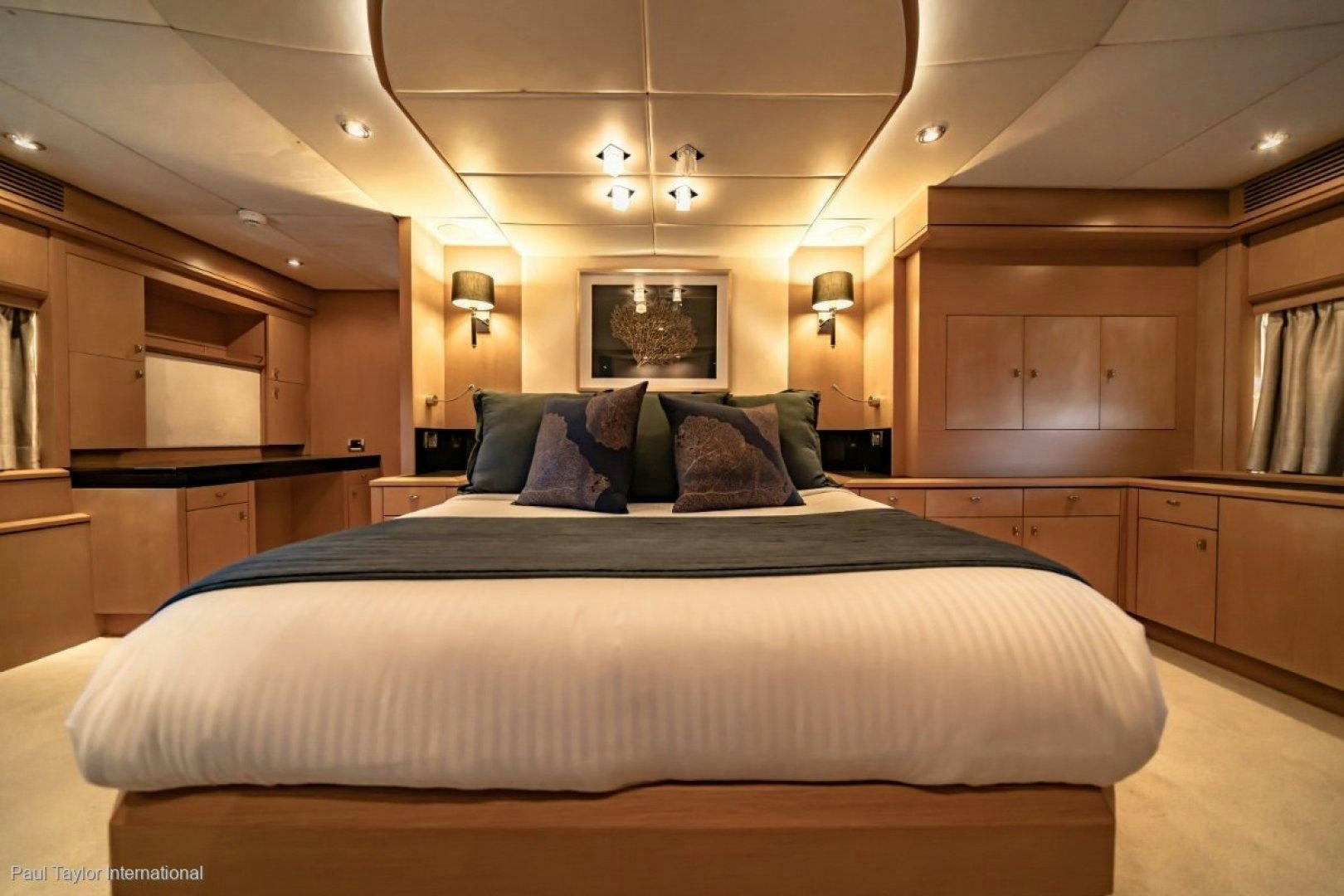 a large bed in a room aboard SOPHIA Yacht for Sale