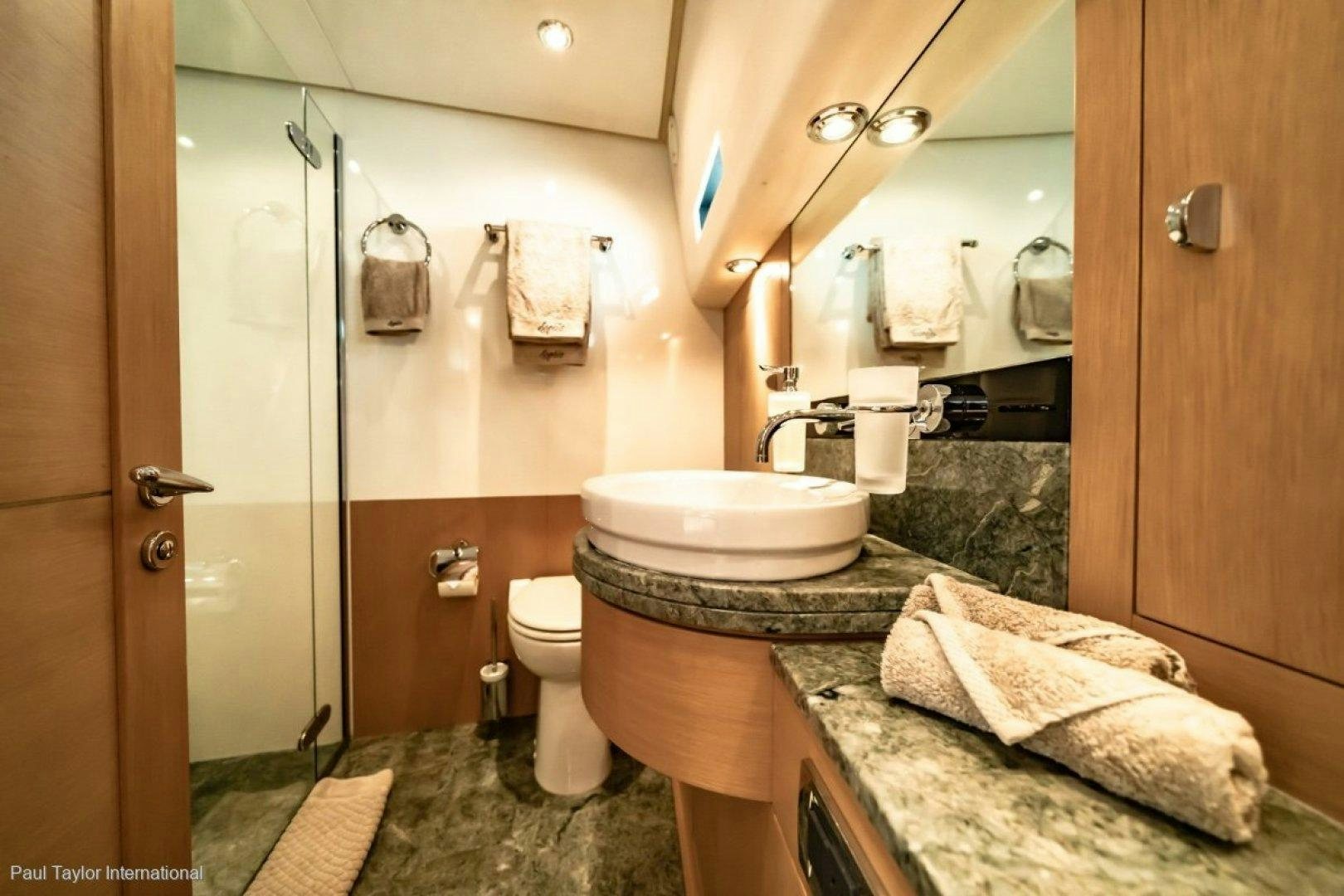 a bathroom with a sink and toilet aboard SOPHIA Yacht for Sale