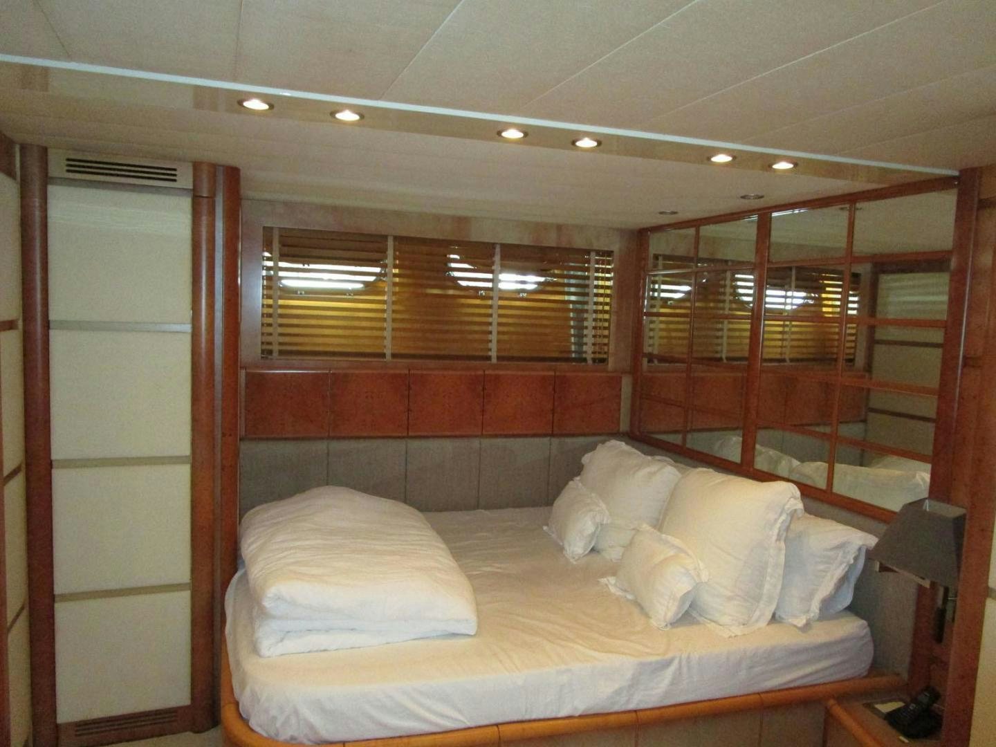 a bed in a room aboard DEAR HENRI Yacht for Sale