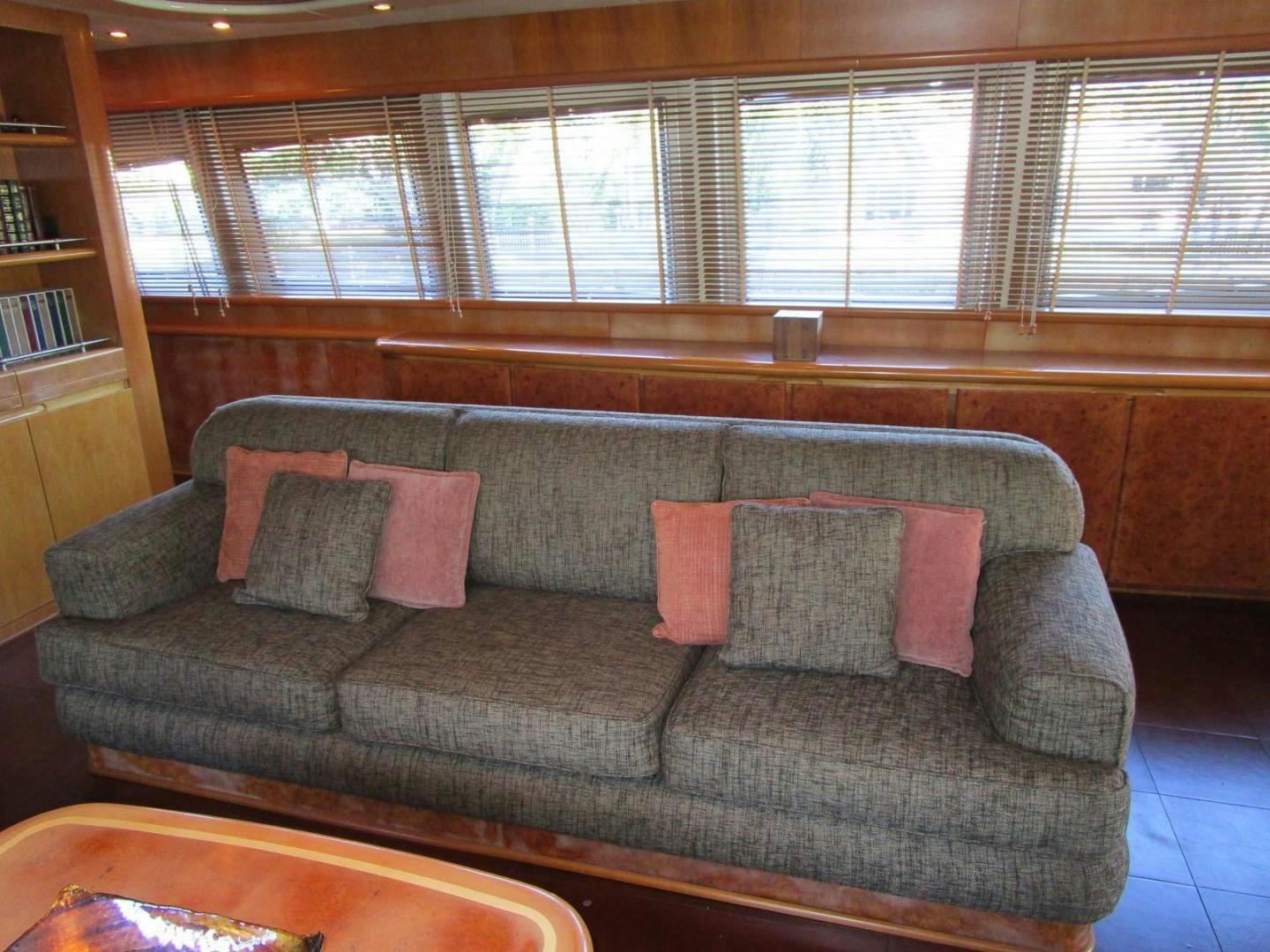 a couch in a room aboard DEAR HENRI Yacht for Sale