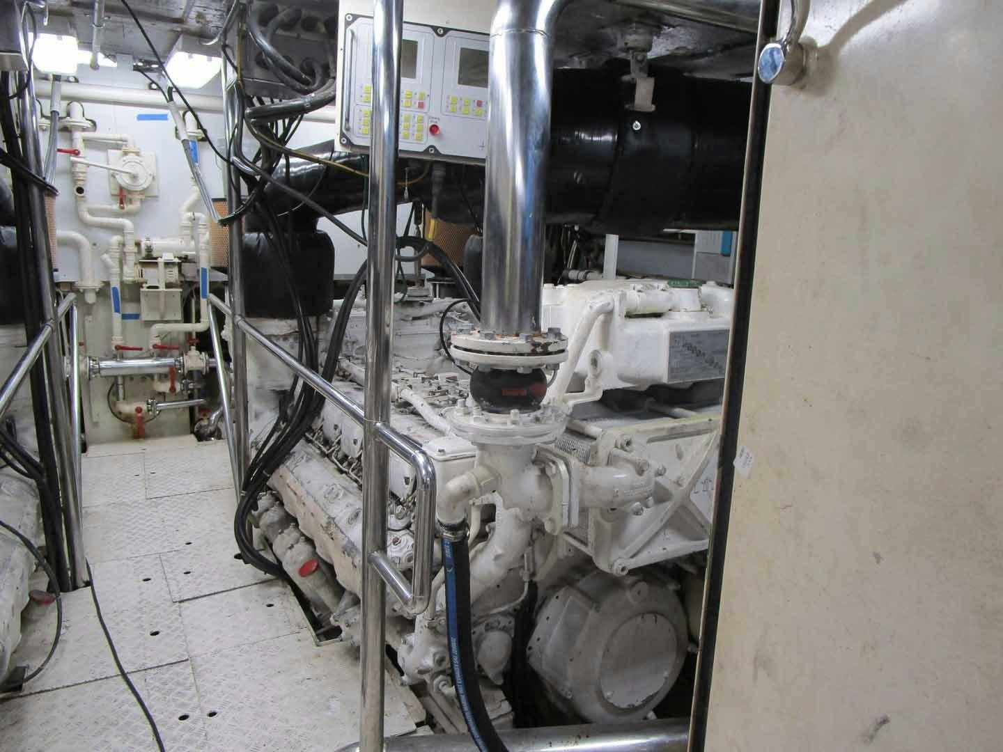a large machine in a room aboard DEAR HENRI Yacht for Sale