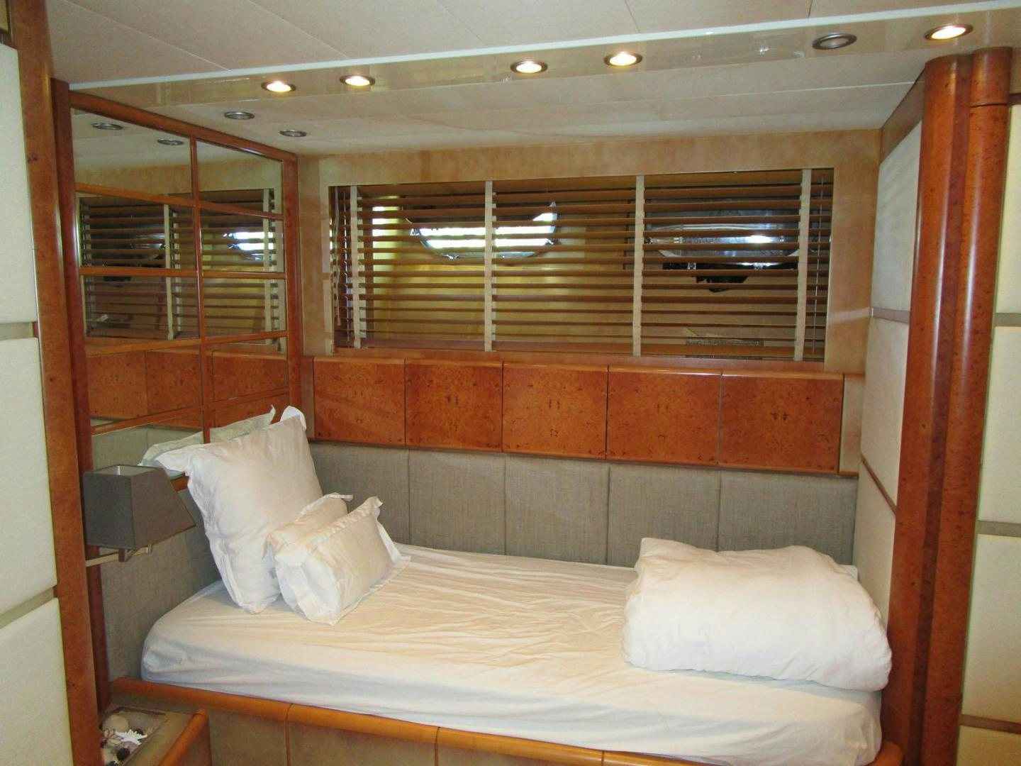 a bed in a room aboard DEAR HENRI Yacht for Sale