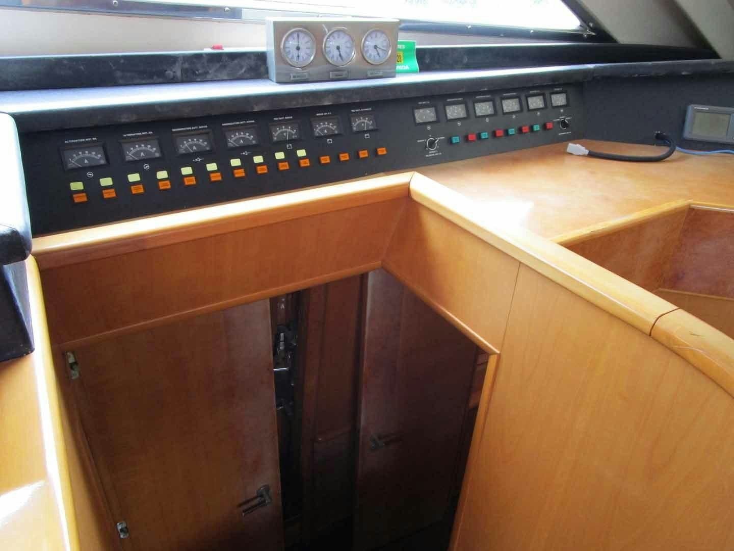 a radio on a table aboard DEAR HENRI Yacht for Sale