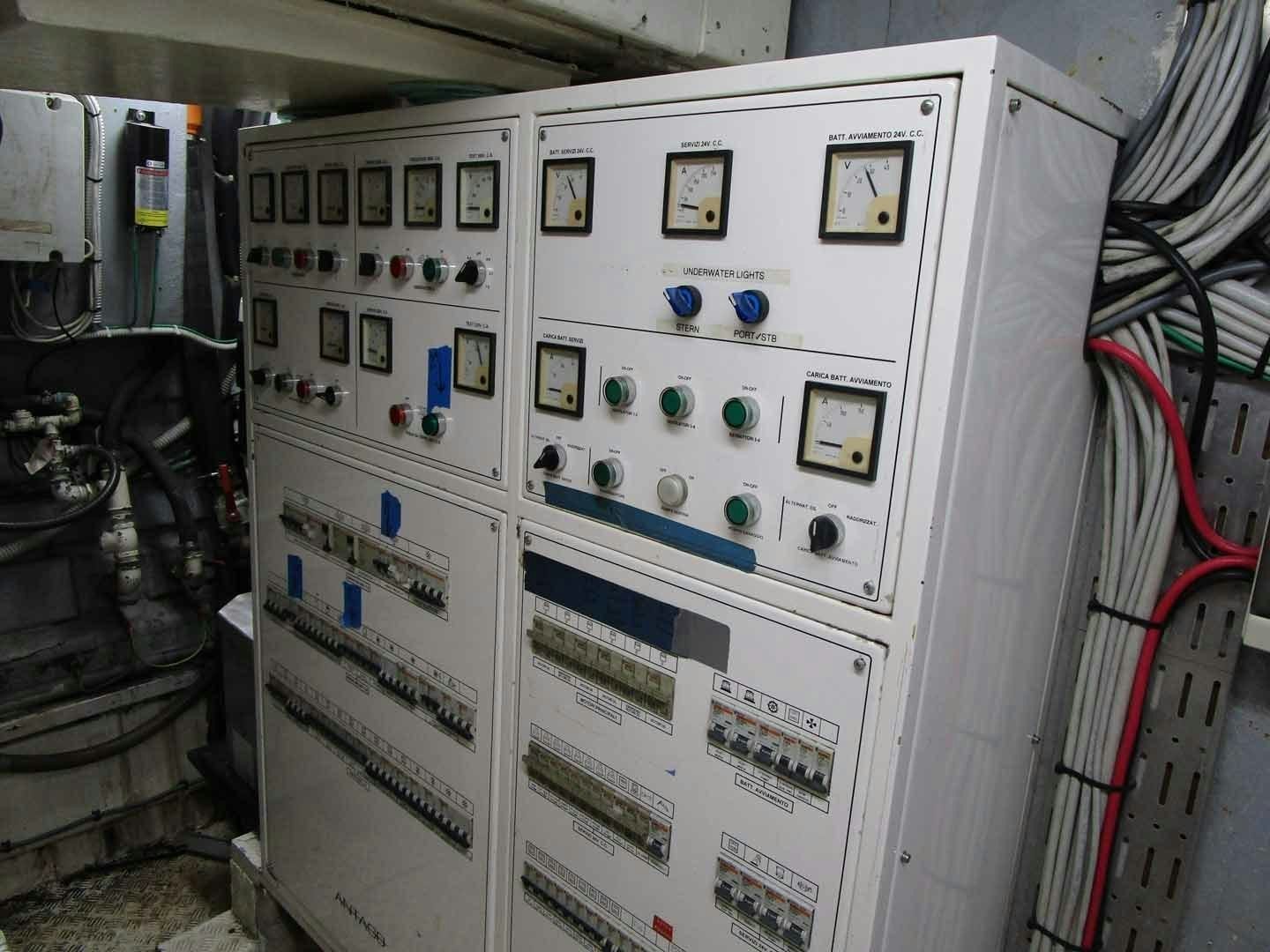 a white refrigerator with many magnets aboard DEAR HENRI Yacht for Sale